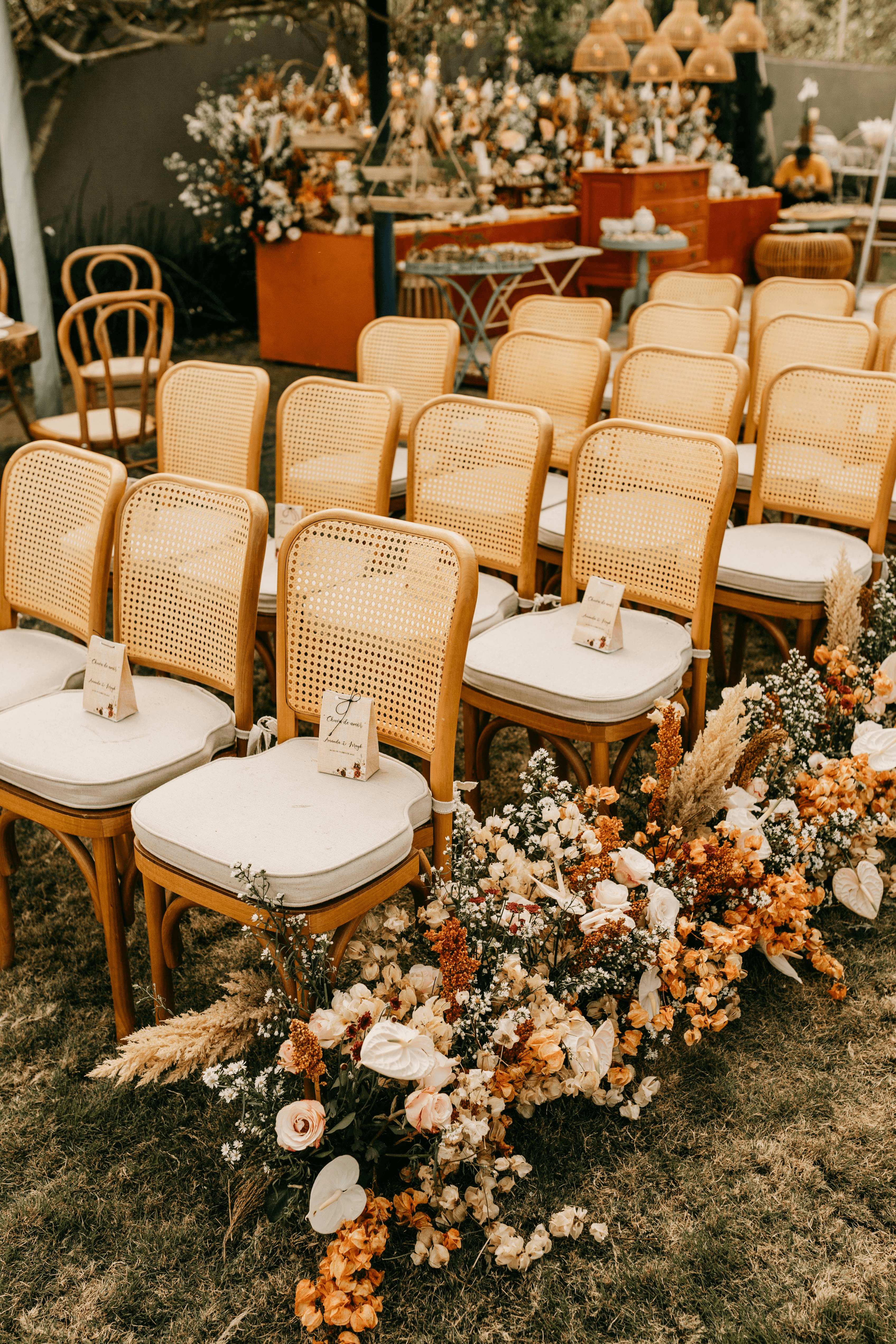 wedding seating with flowers down aisle
