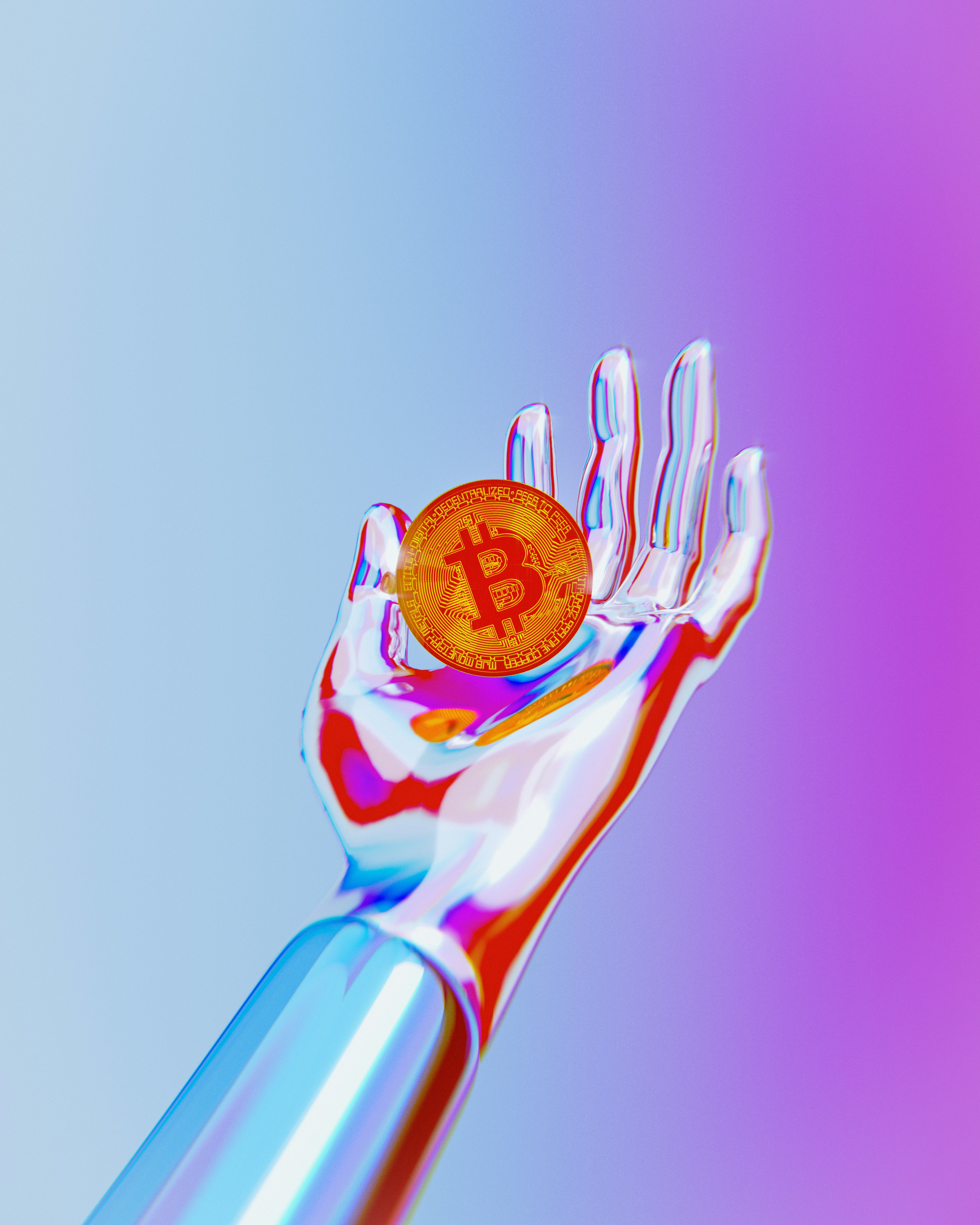 A hand holding a bitcoin in it's palm