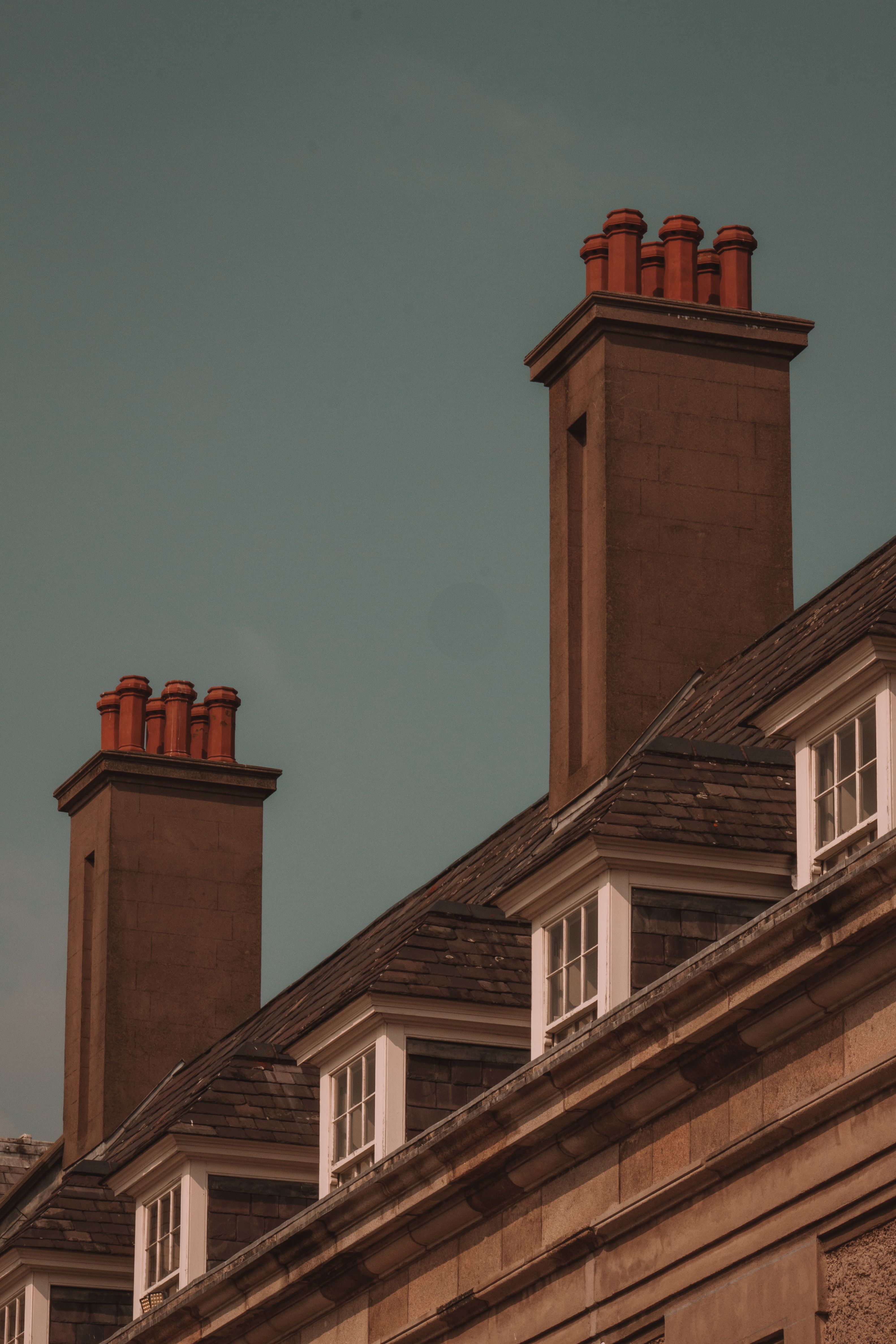 Illustrative rooftop and chimney photograph; not completed Bright Cobble work