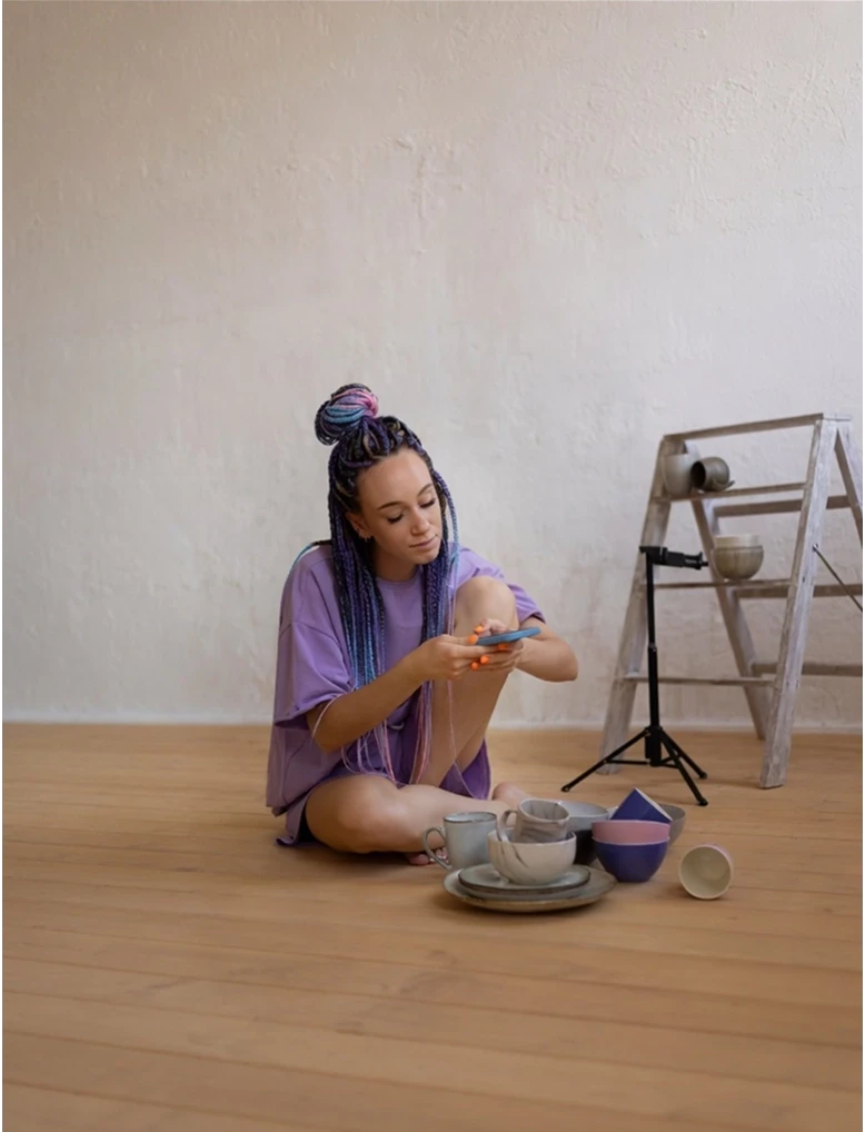 Young woman creating content with craft materials