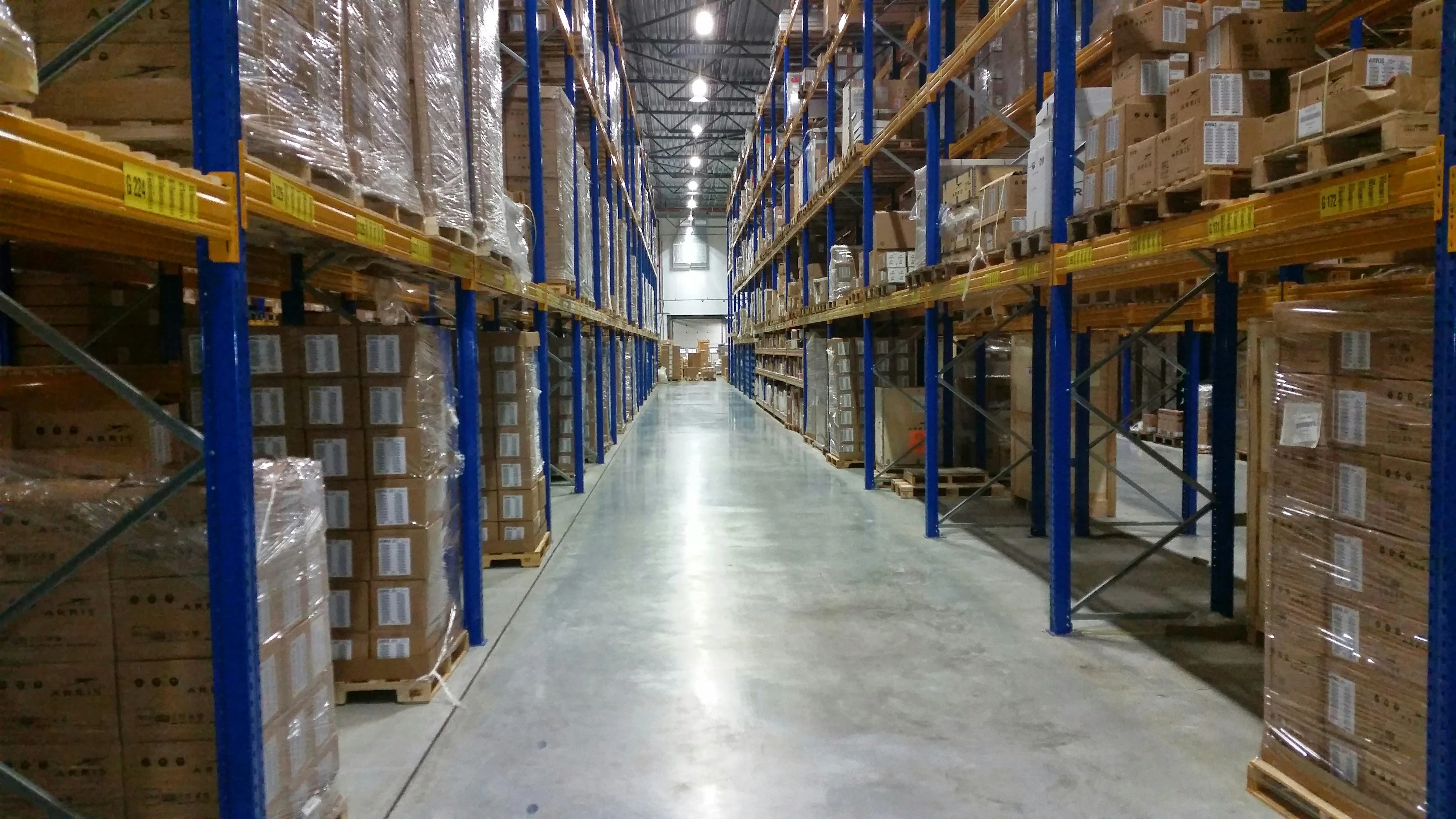 a large warehouse filled with lots of shelves