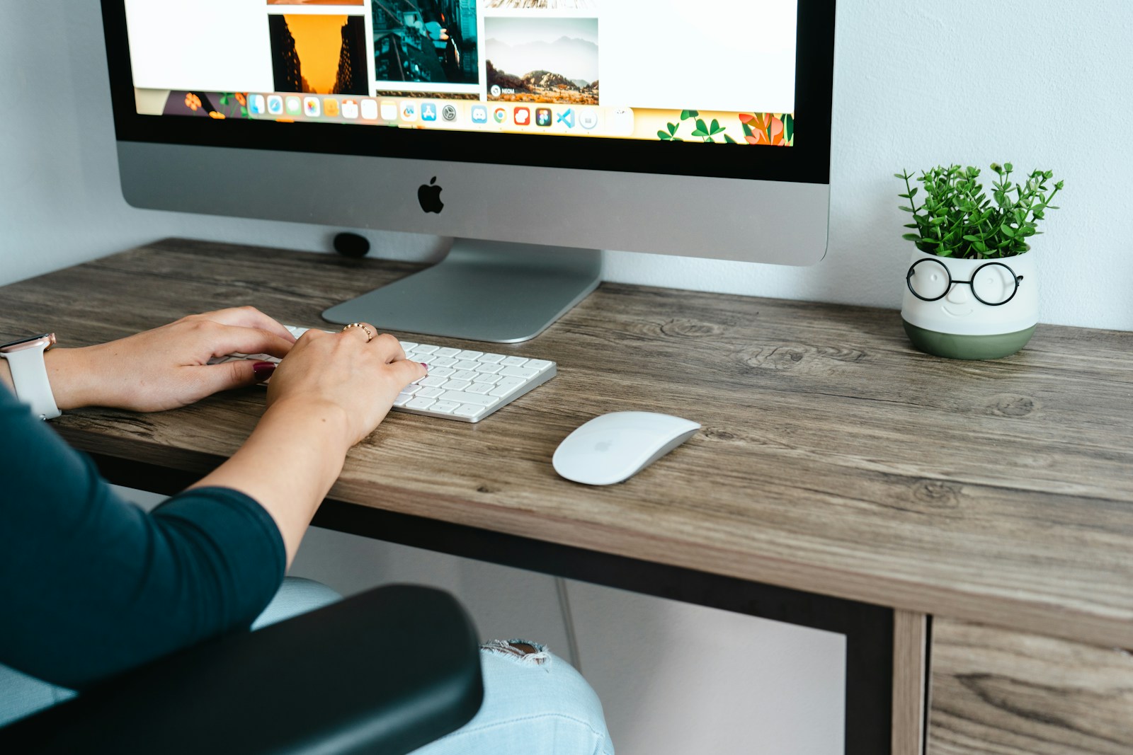 Graphic designer working at a desktop computer