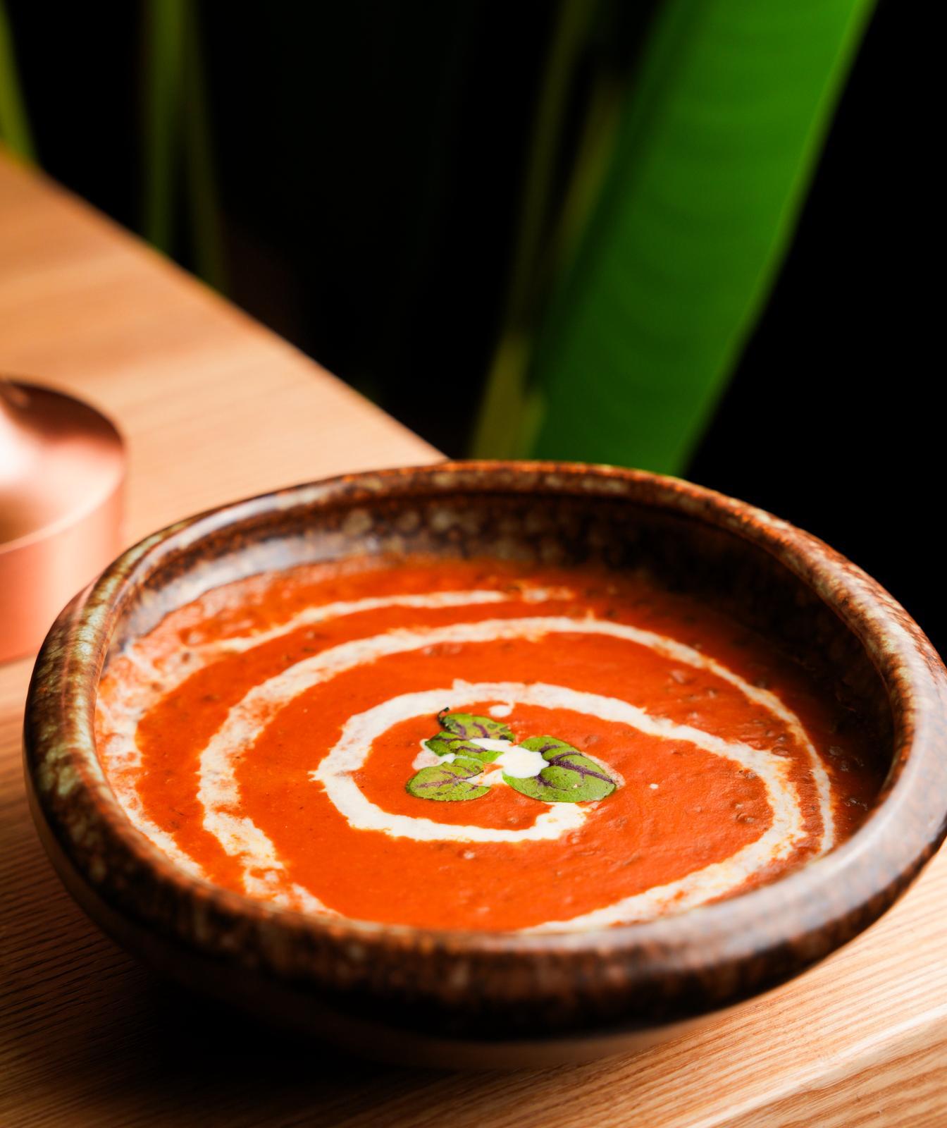 Slow-cooked dal makhani at Dhoom in Greektown Toronto, creamy black lentils with butter and spices