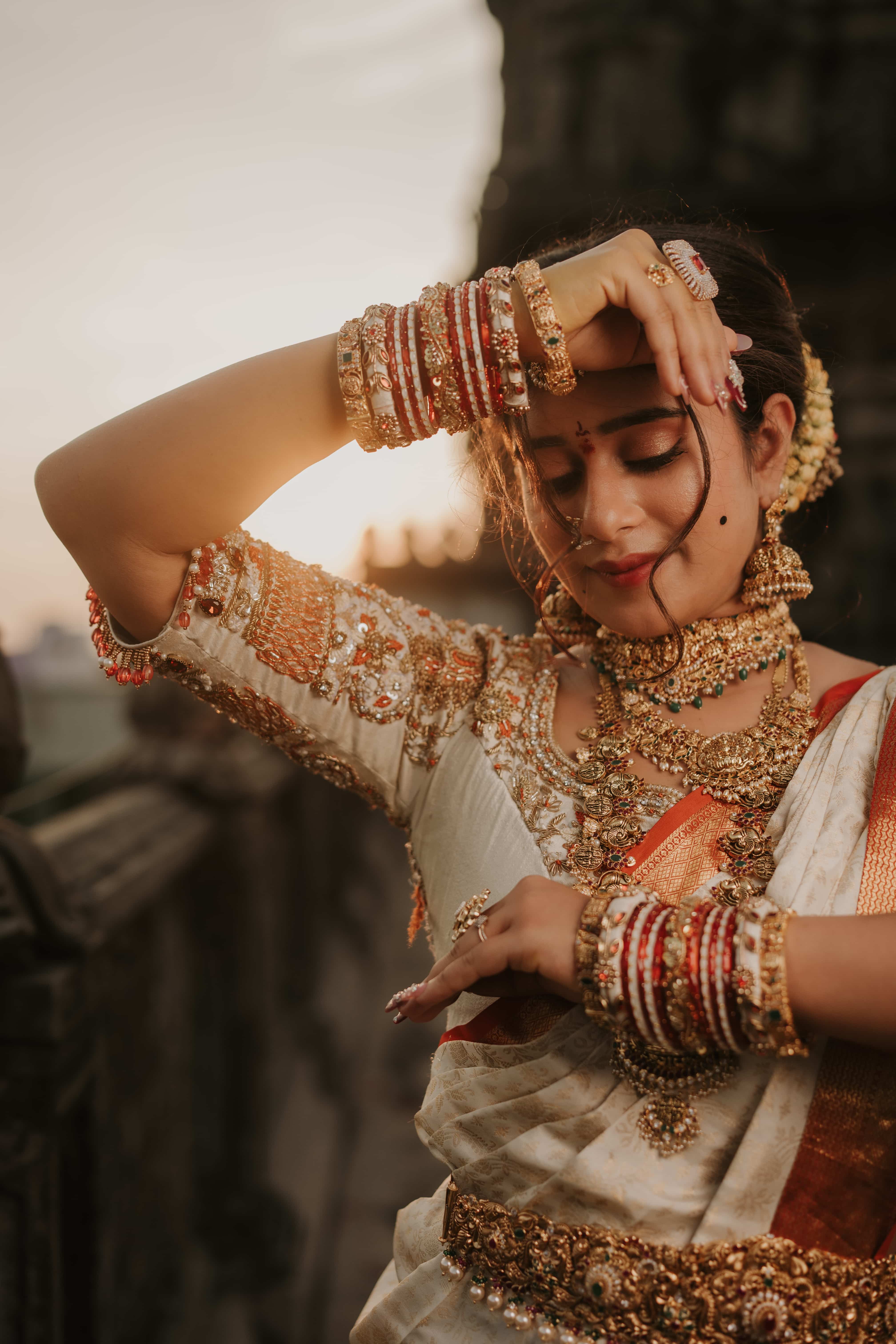 Wedding day photo collage with bride and groom in maroon and gold attire, jewelry and ring close-ups, captured by Wow Makers in Hyderabad, India.