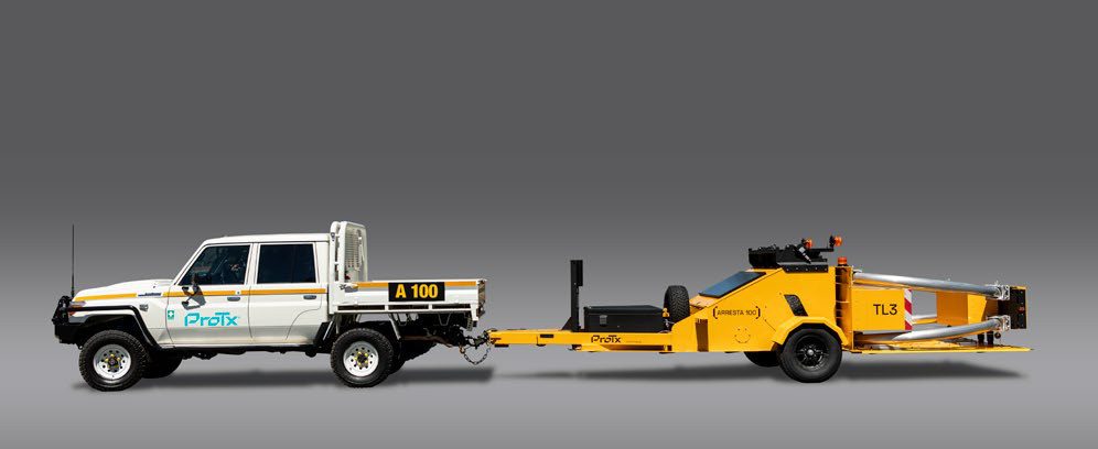 The ProTx Arresta100 towable barrier trailer behind a work ute
