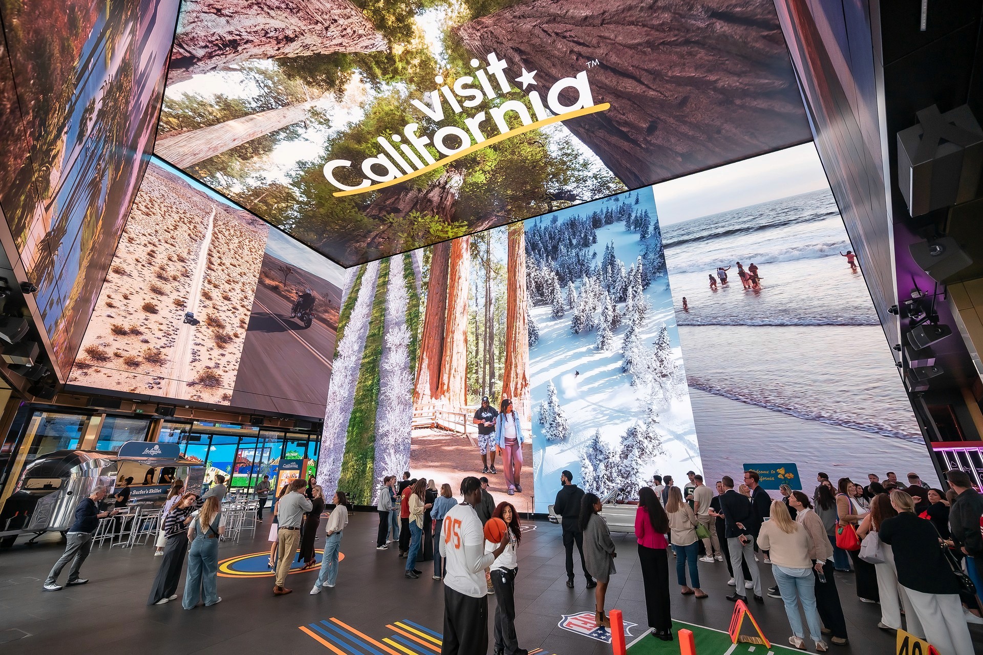 Visit California immersive brand activation at Outernet London, featuring large-scale digital screens, scenic event design and guests exploring the live experience.