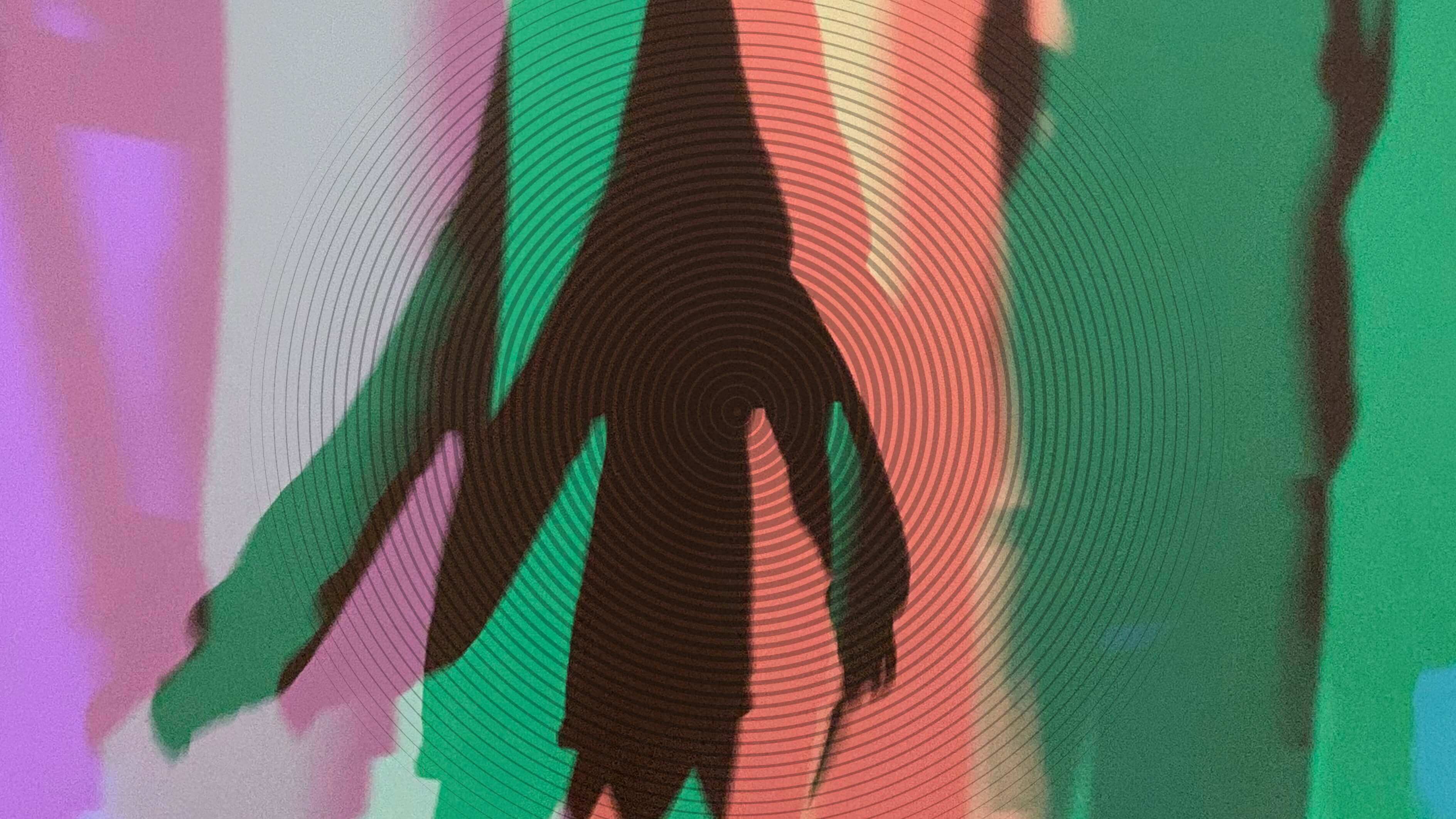 a man holding a cocktail