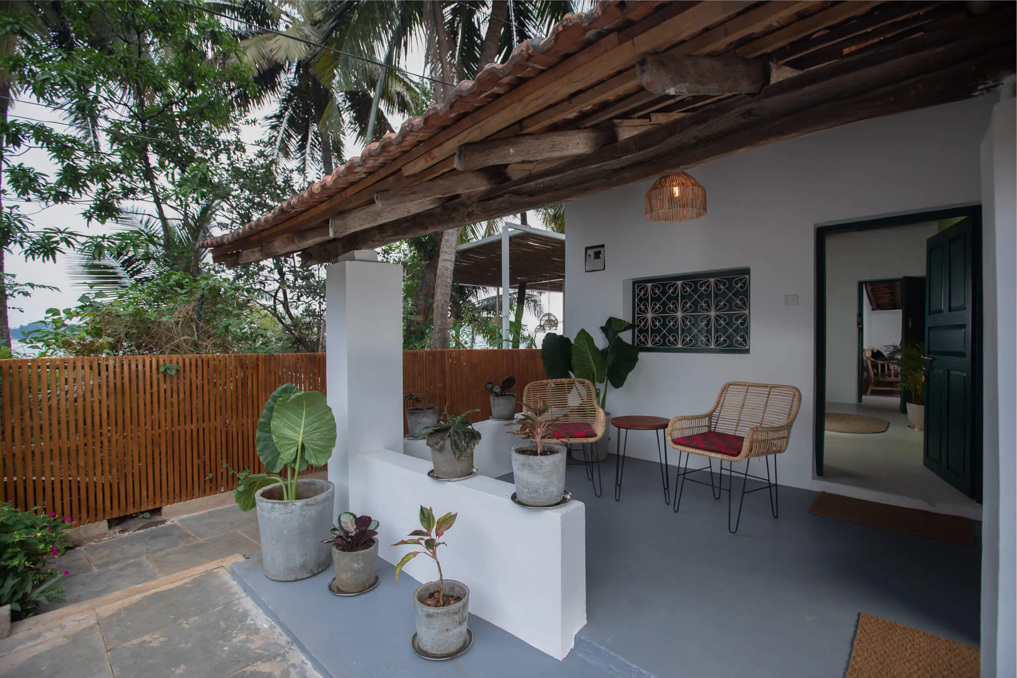 The beach house veranda above the water at Casa Jaali