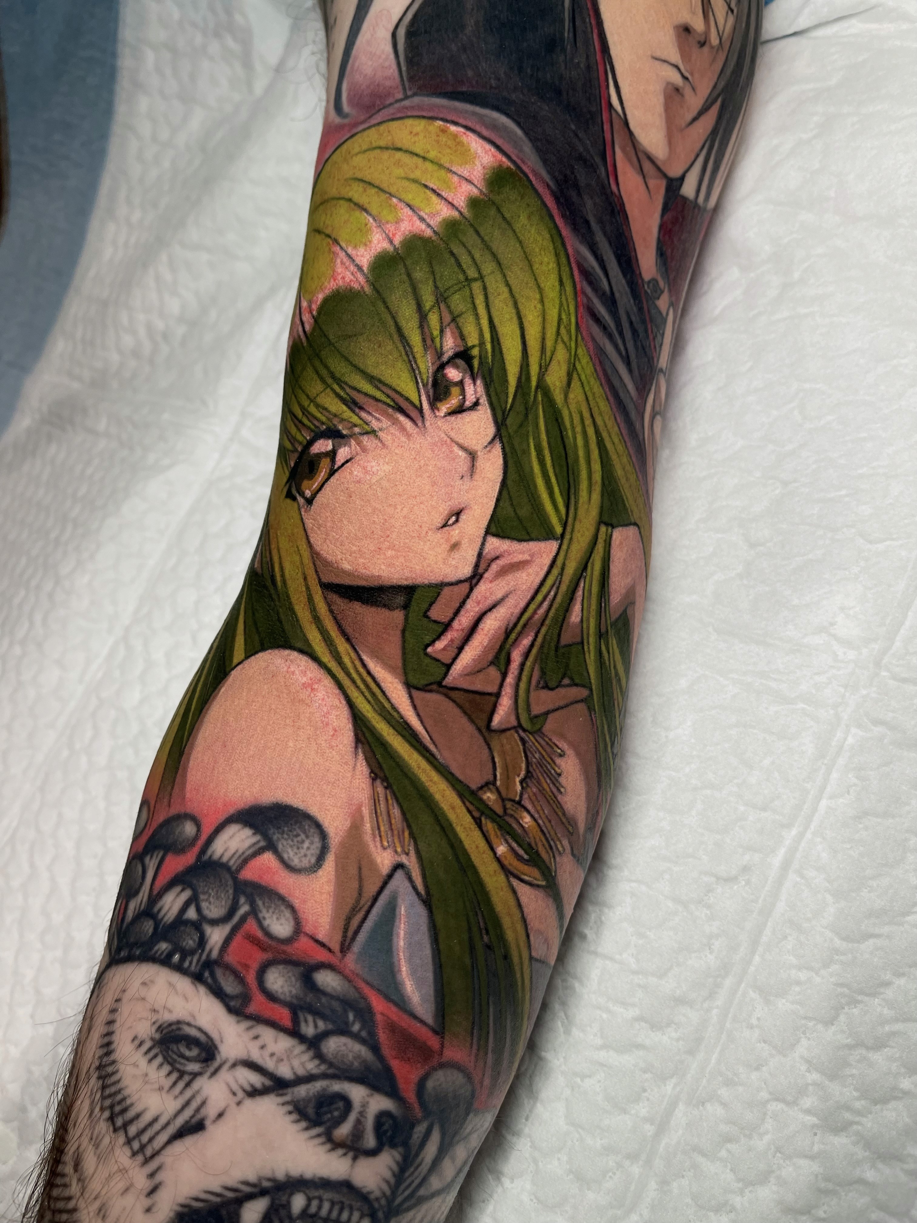 colorful c.c anime tattoo from code geass in wynthall birmingham in england