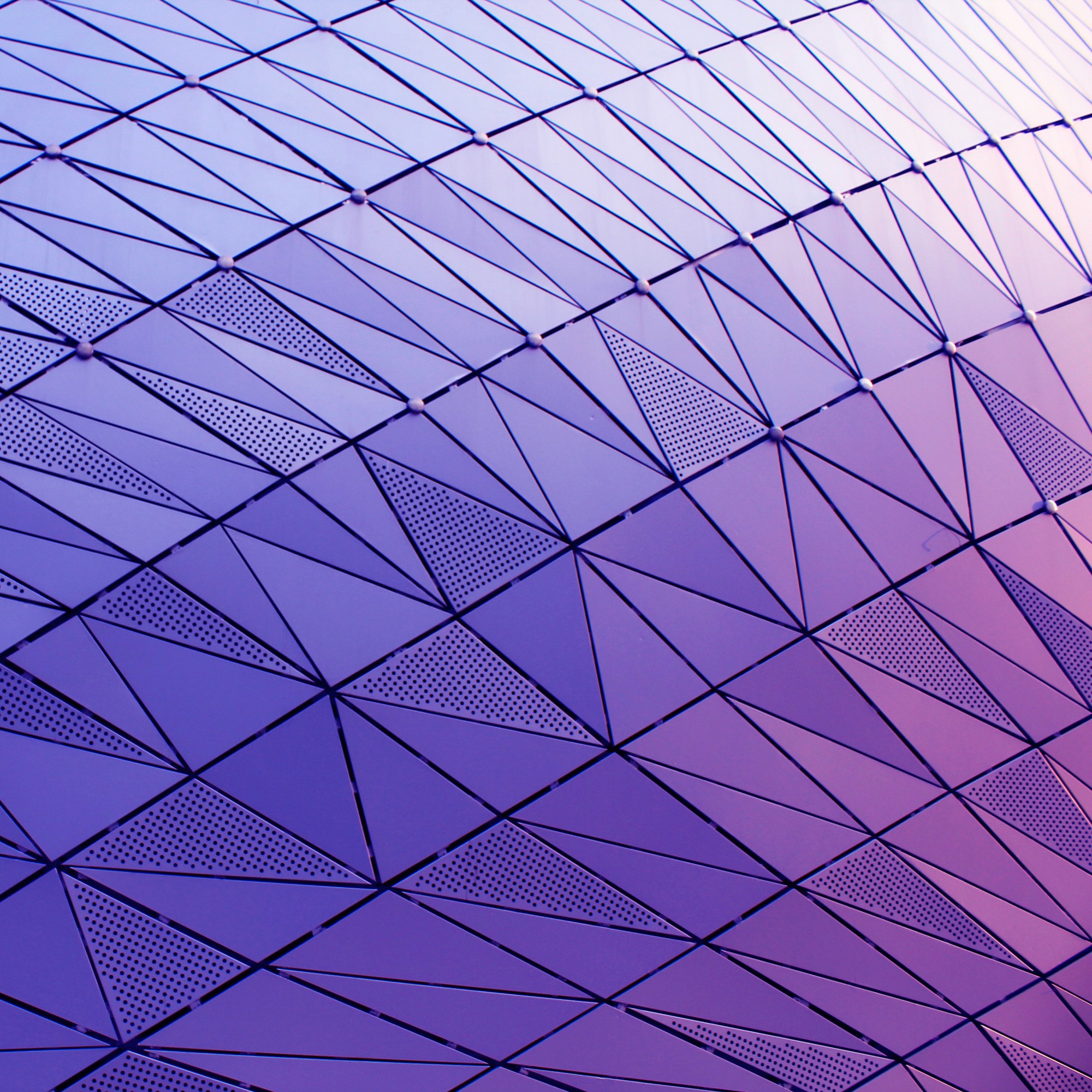 Abstract geometric windows in purple lighting