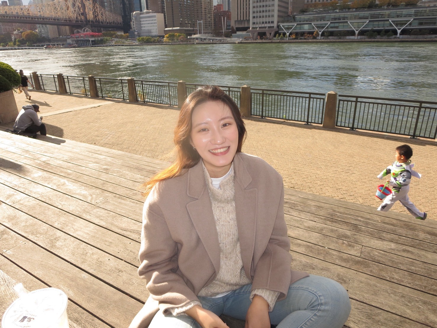 a man with a goatee smiles at the camera