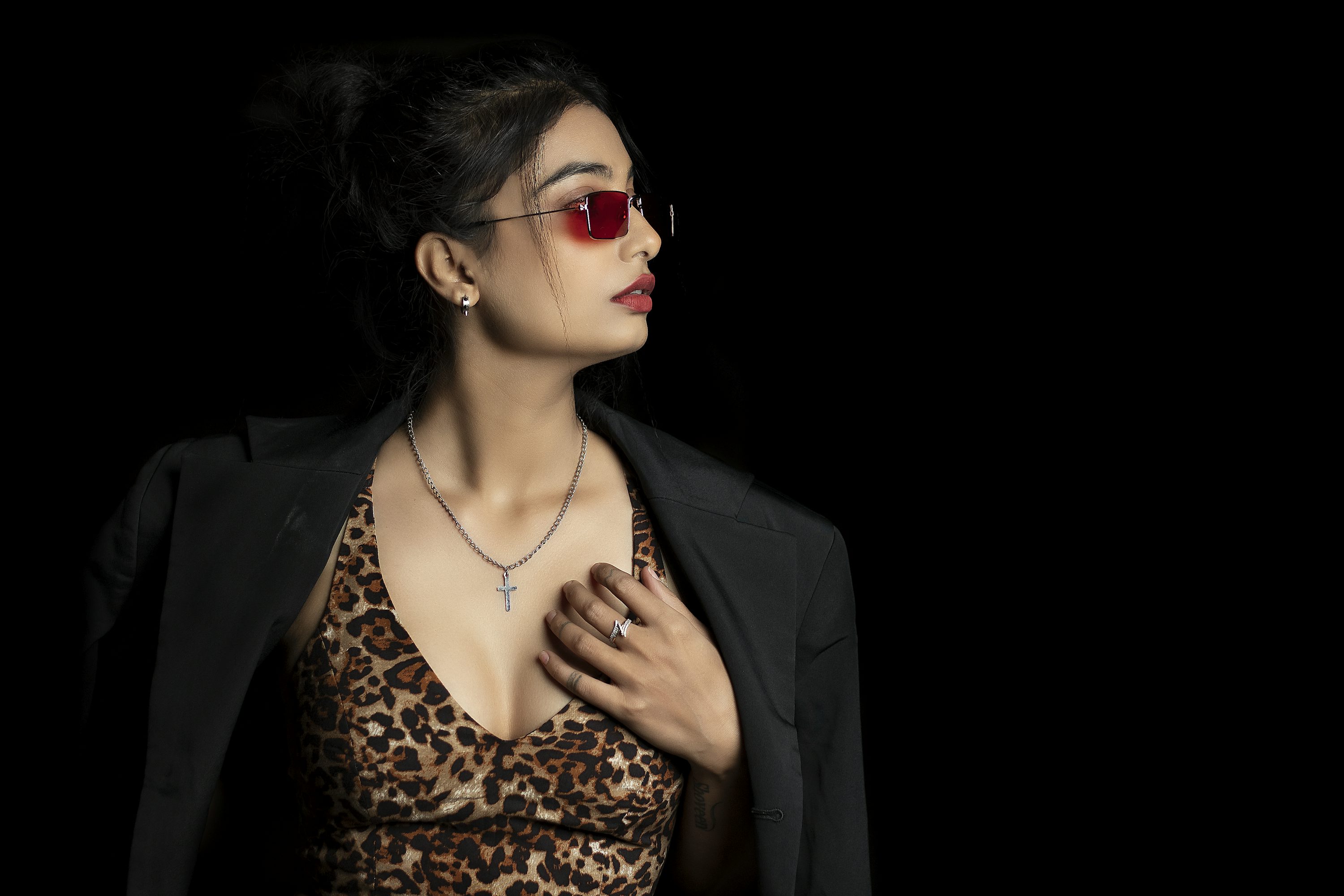 kids lying on a glass land and smiling