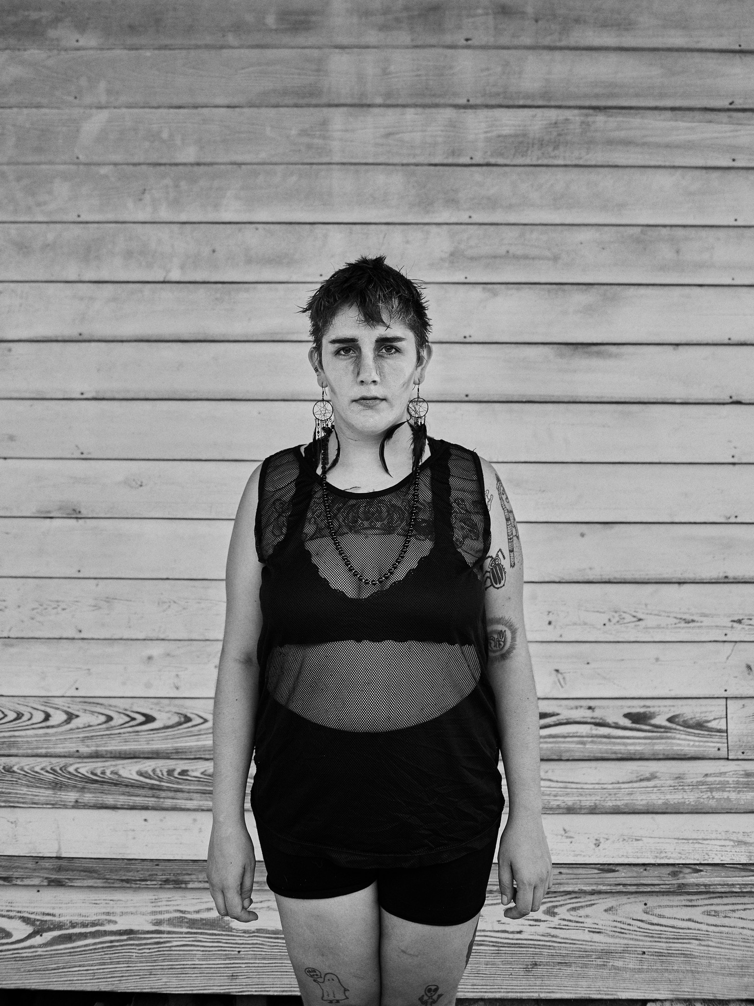 Black and white portraits of young alternative, romantic, goth, freak, punk and metal character against a textured New Orleans backdrop. 