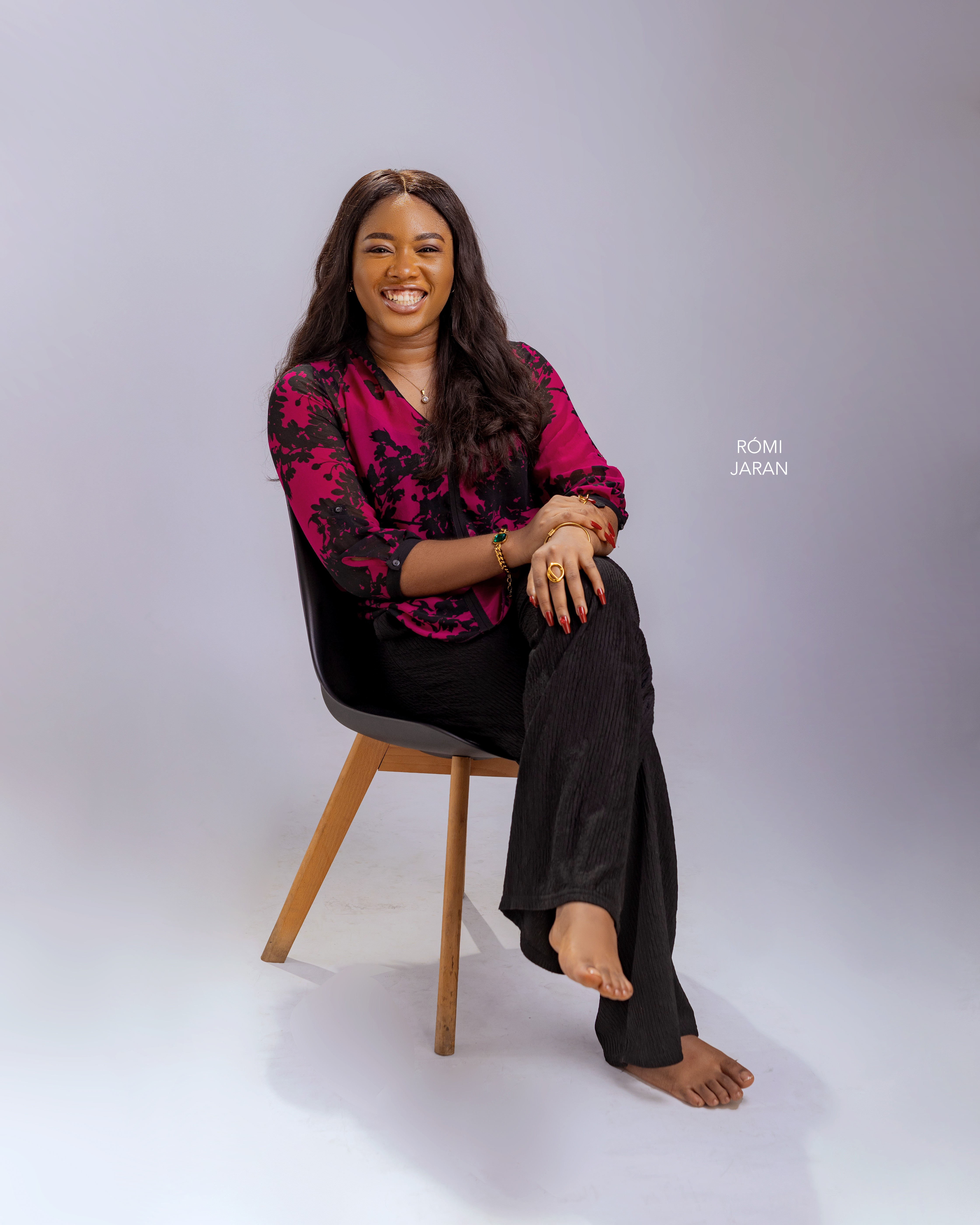 A photograph of Divine John-Okpala. photographed by Romijaran Studios