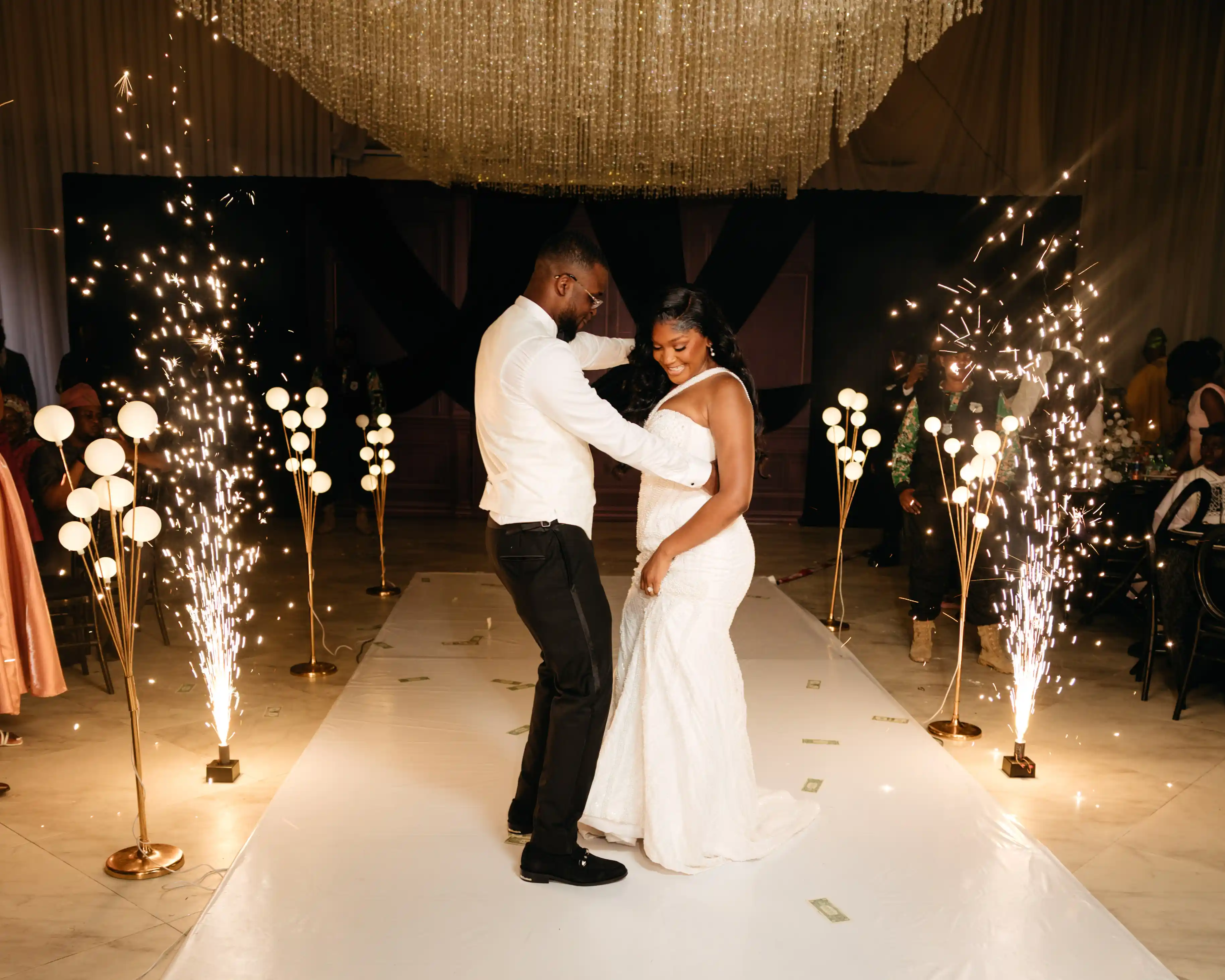 Bride and groom celebrating a luxury wedding coordinated by Victoria Brooks Events, a premium wedding planner in Nigeria.