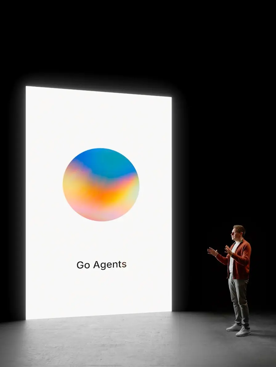 Man presenting to screen with abstract circle and text