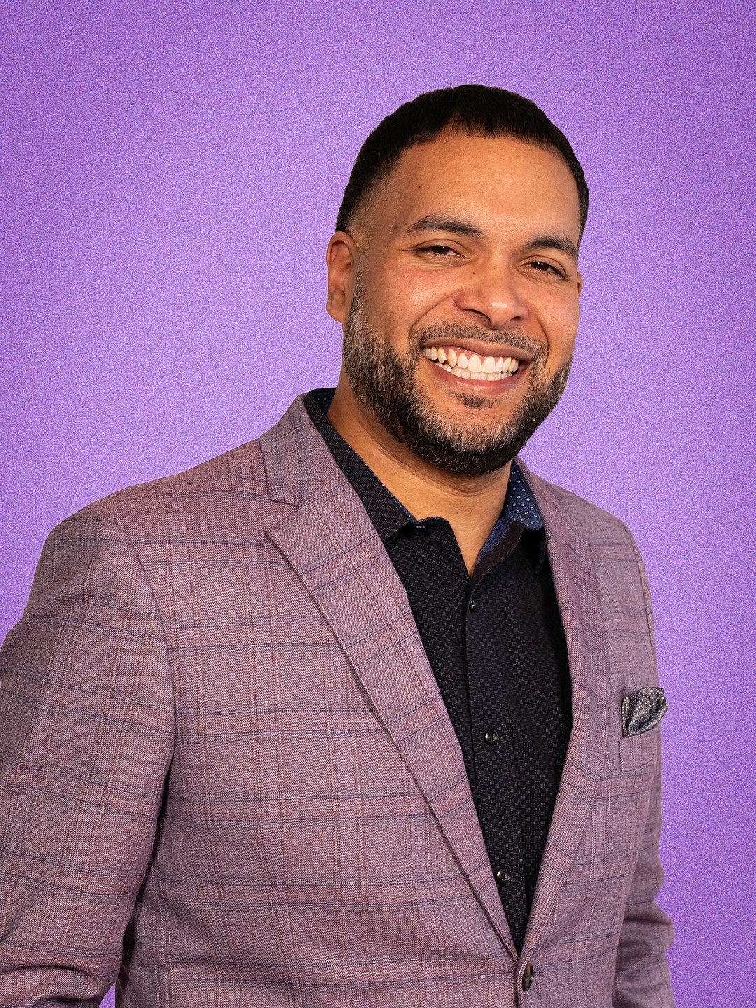 man stranding on straight road photo during daytime