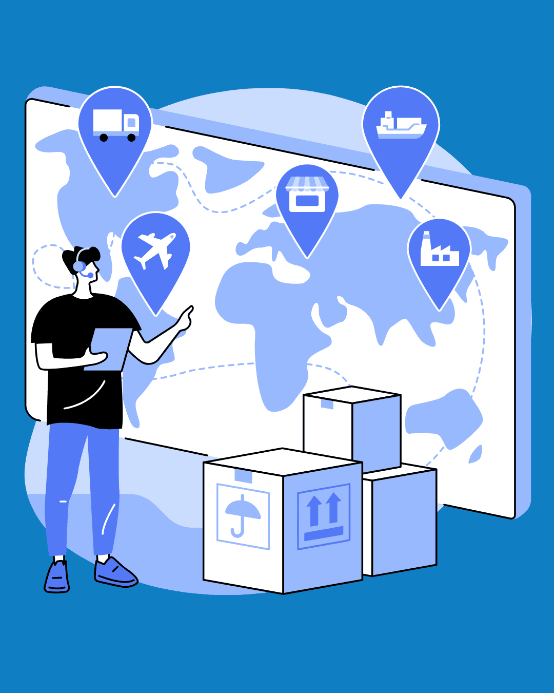 A man with long hair is working on a computer.