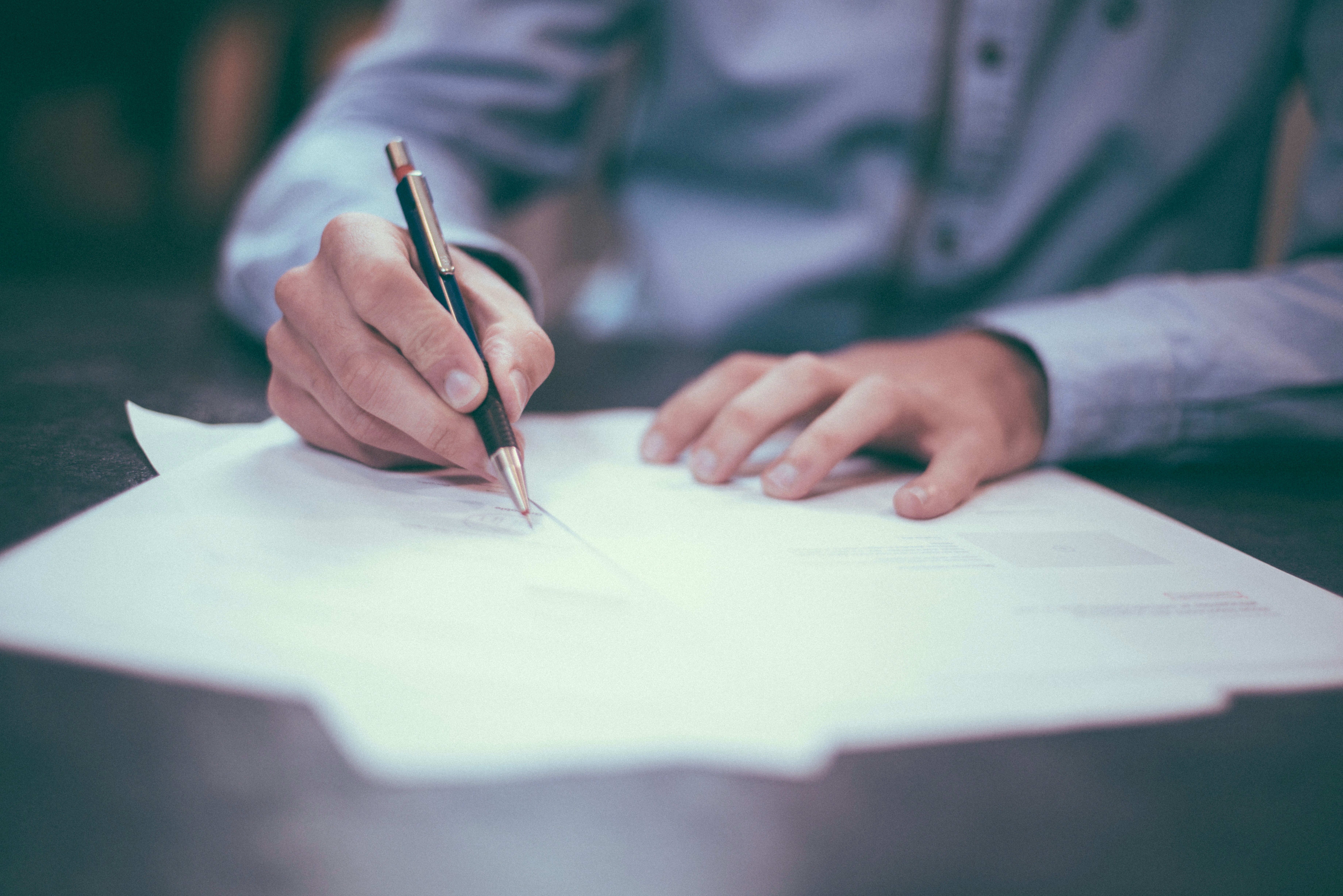A recipient signing for a delivery