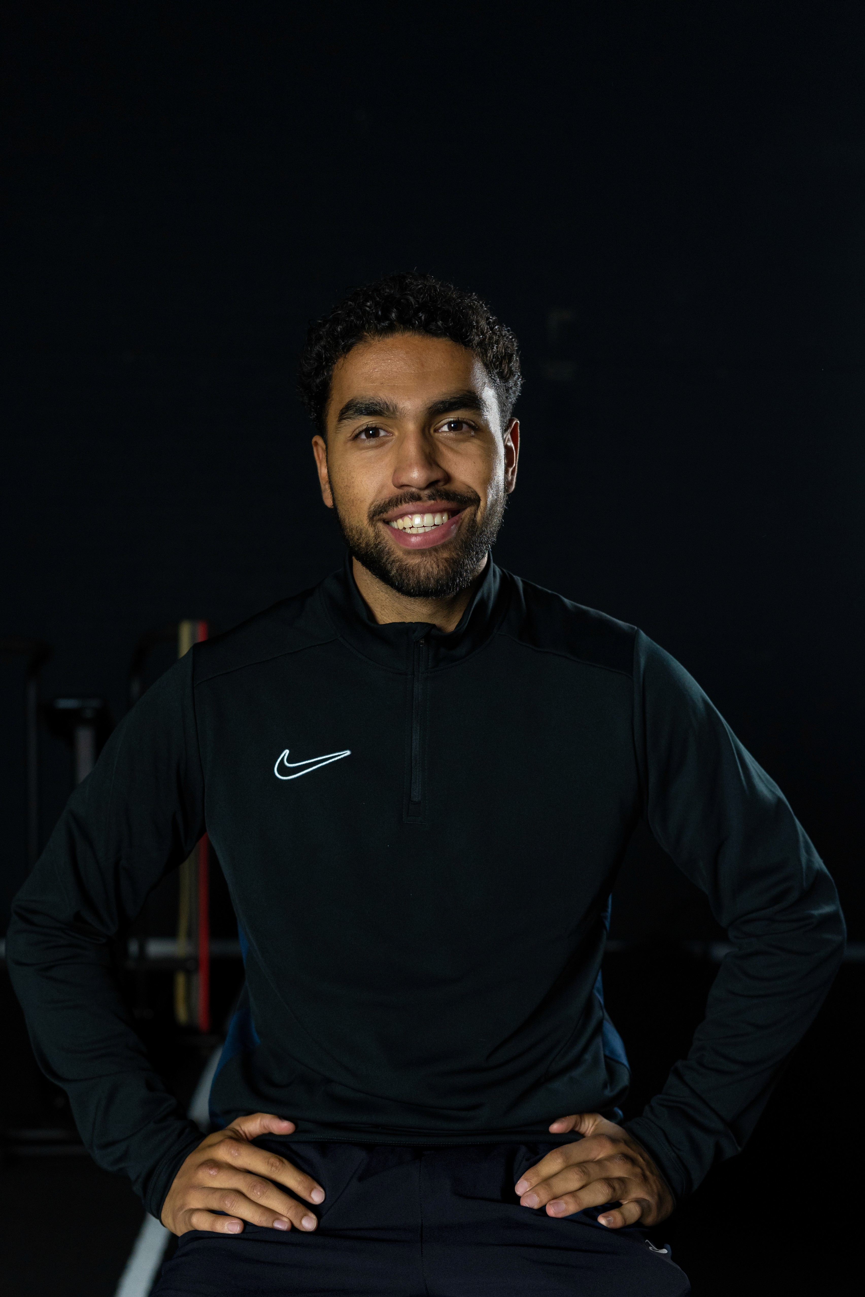 Coach explaining something to an athlete