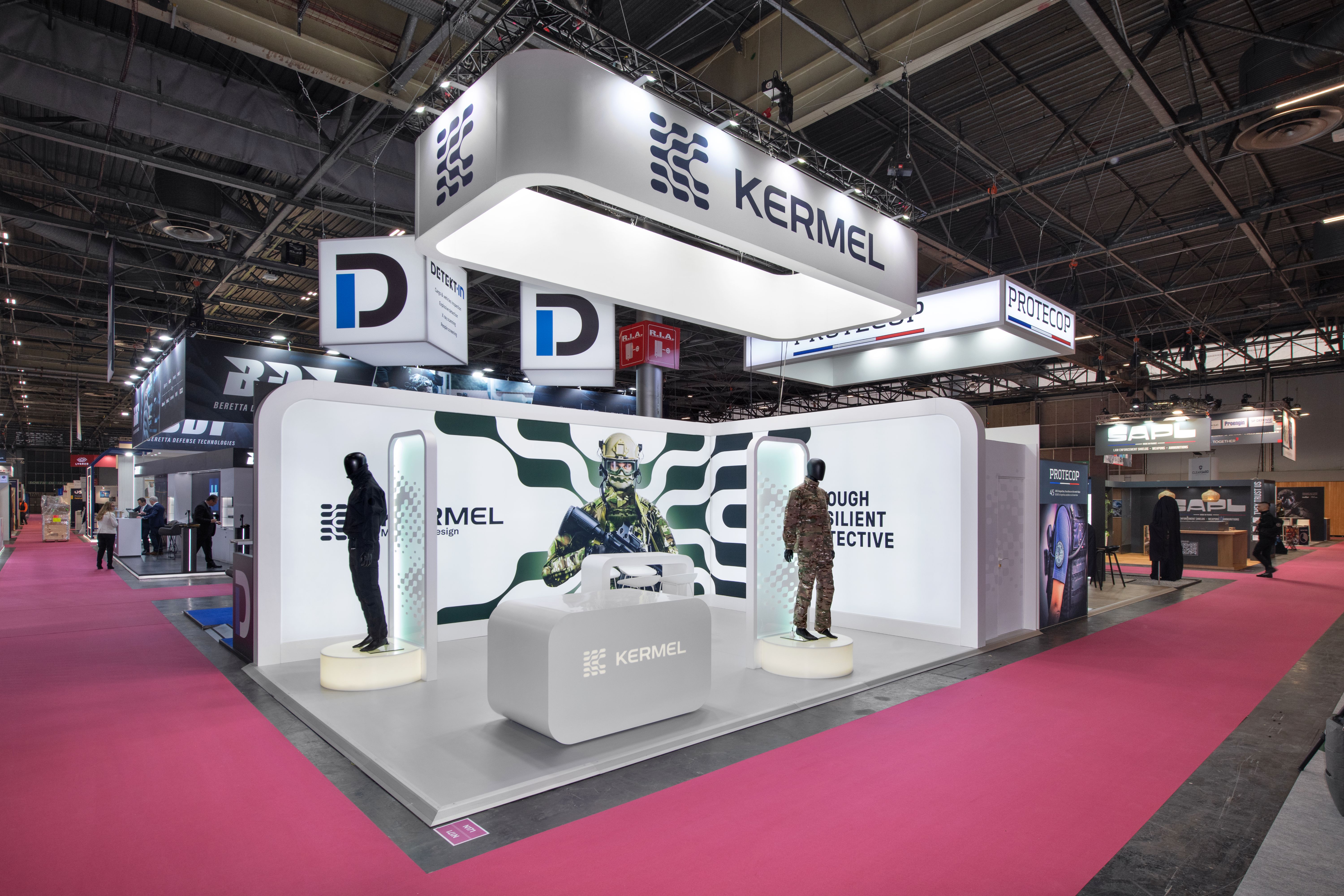 Stand KERMEL Milipol Paris 2025 – détail zone produits avec identité visuelle Tough Resilient Protective, stand réalisé par Expace