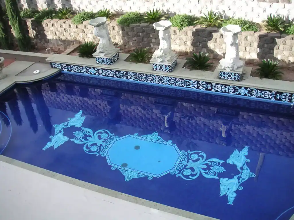 The finished all-tile mosaic pool, filled and in use — Mosaiclegs Art Studio