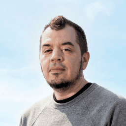 Possible member looking at the camera.