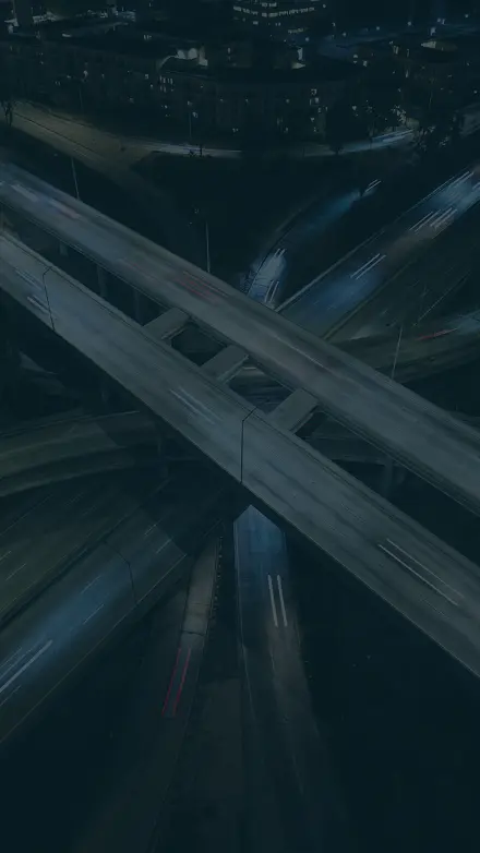 Busy crossroads at night