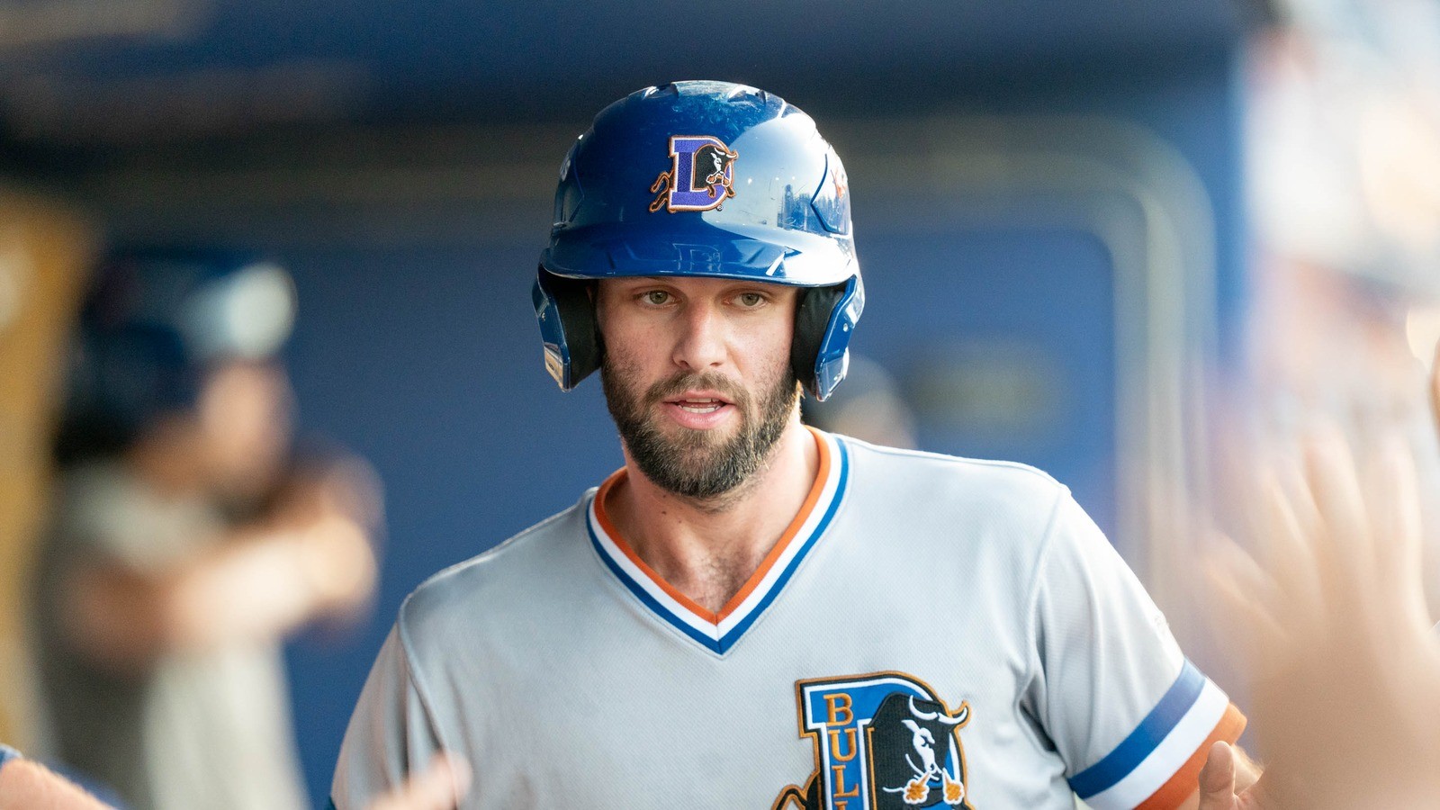 Close-up of Tristan Peters in a batting helmet, face centered