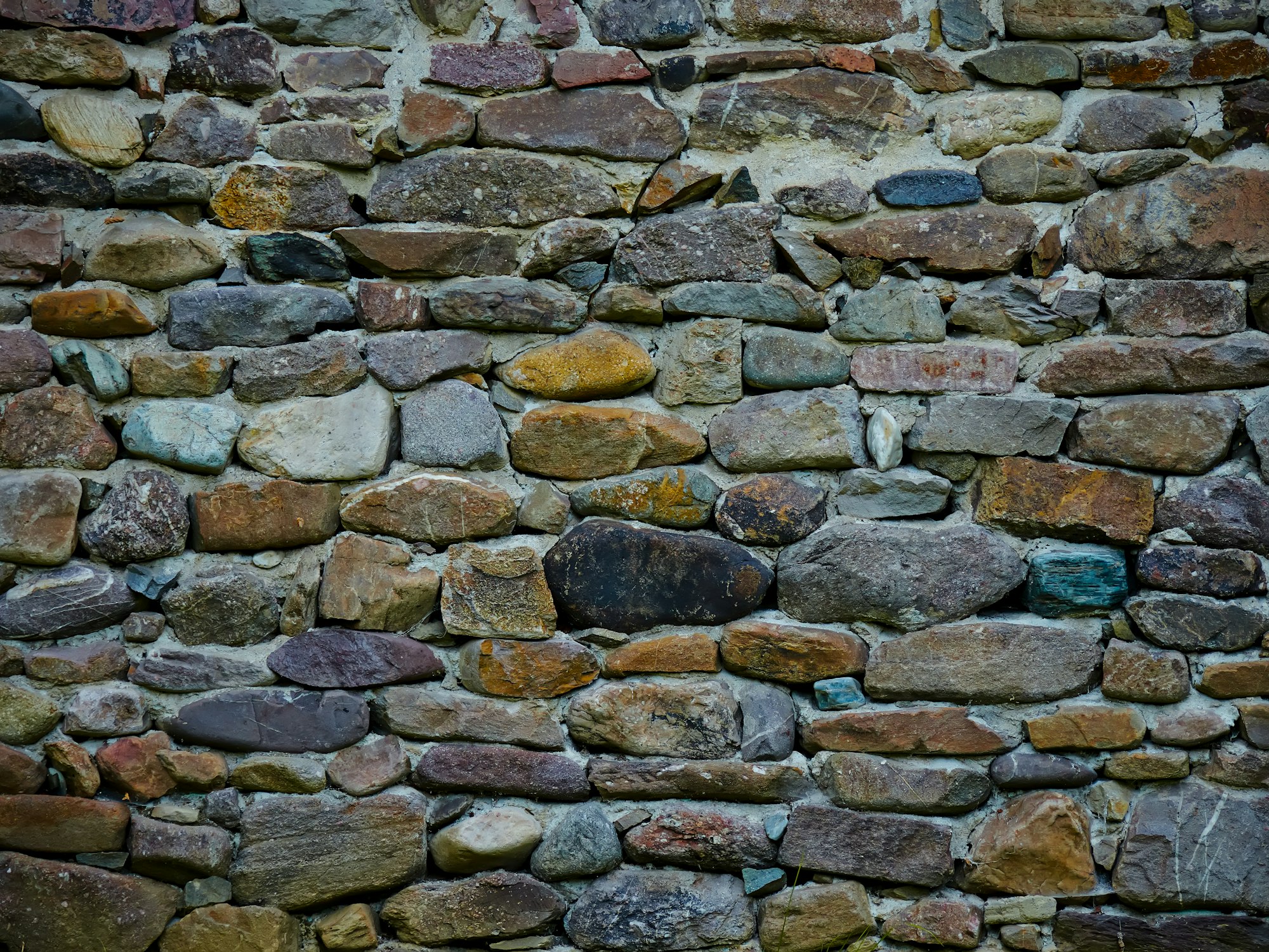 The dry stone walls, rebuilt stone by stone
