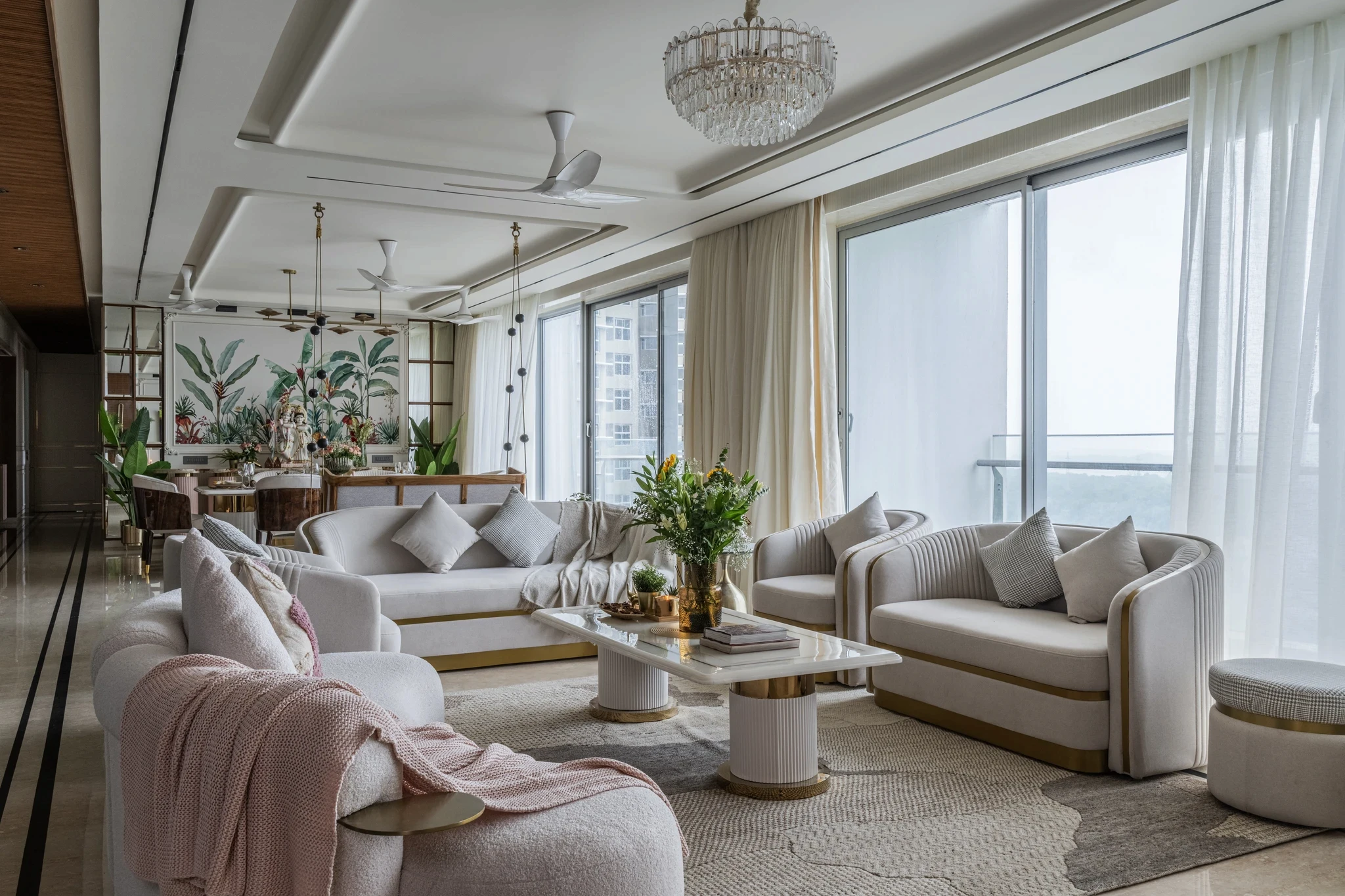 gray padded chaise couch beside window