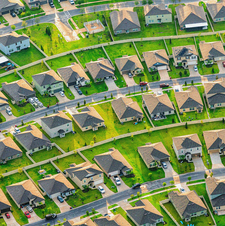 Birds-eye view of multiple houses in a neighborhood
