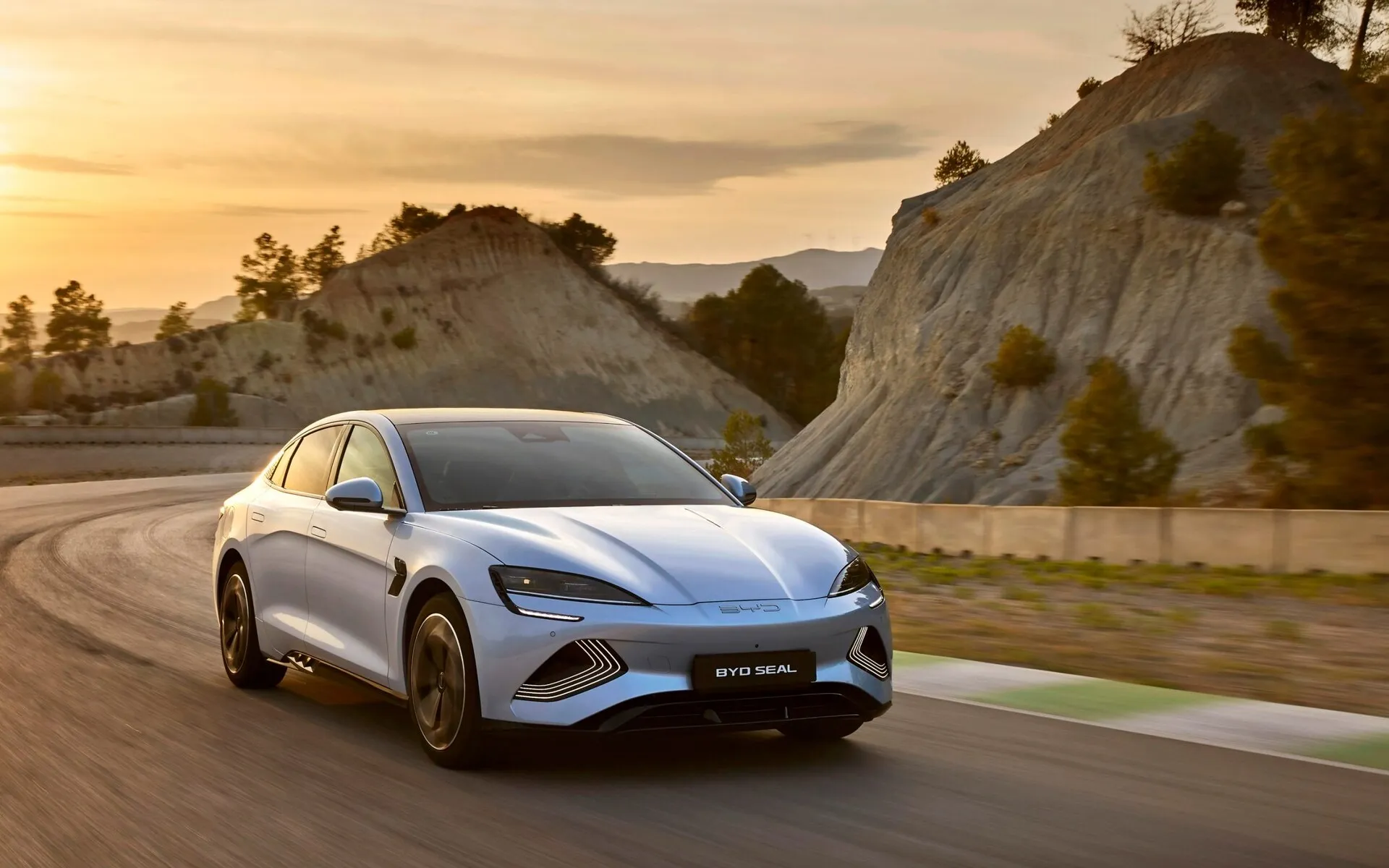 Group of men standing with Sufboard
