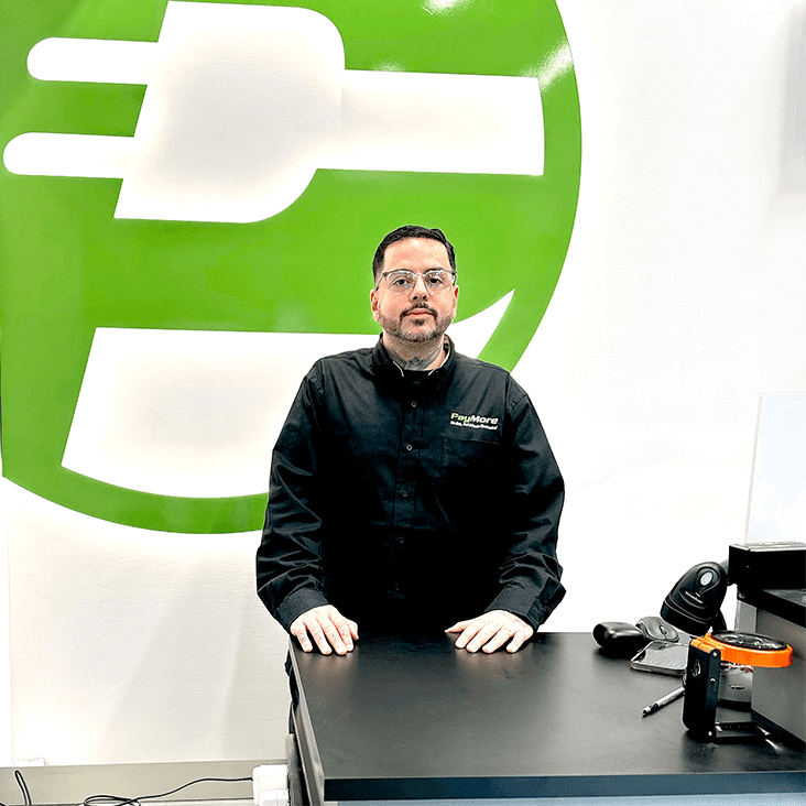 Staff member at a PayMore store
