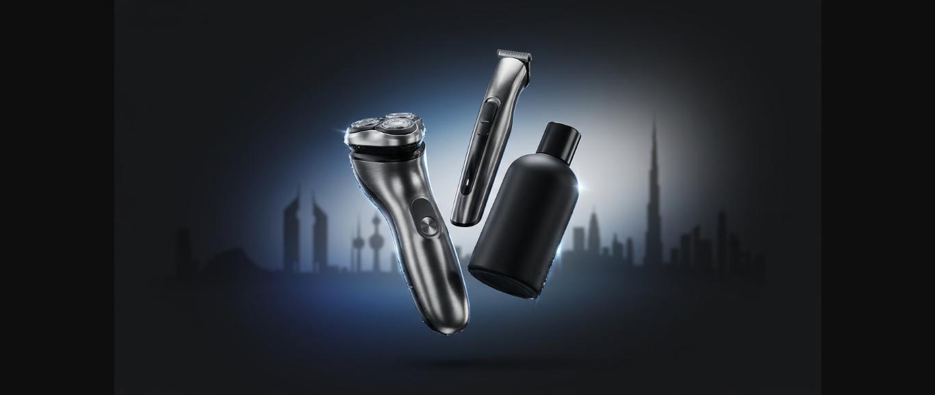 Premium men's grooming tools including electric razor, trimmer, and black bottle with Dubai skyline background