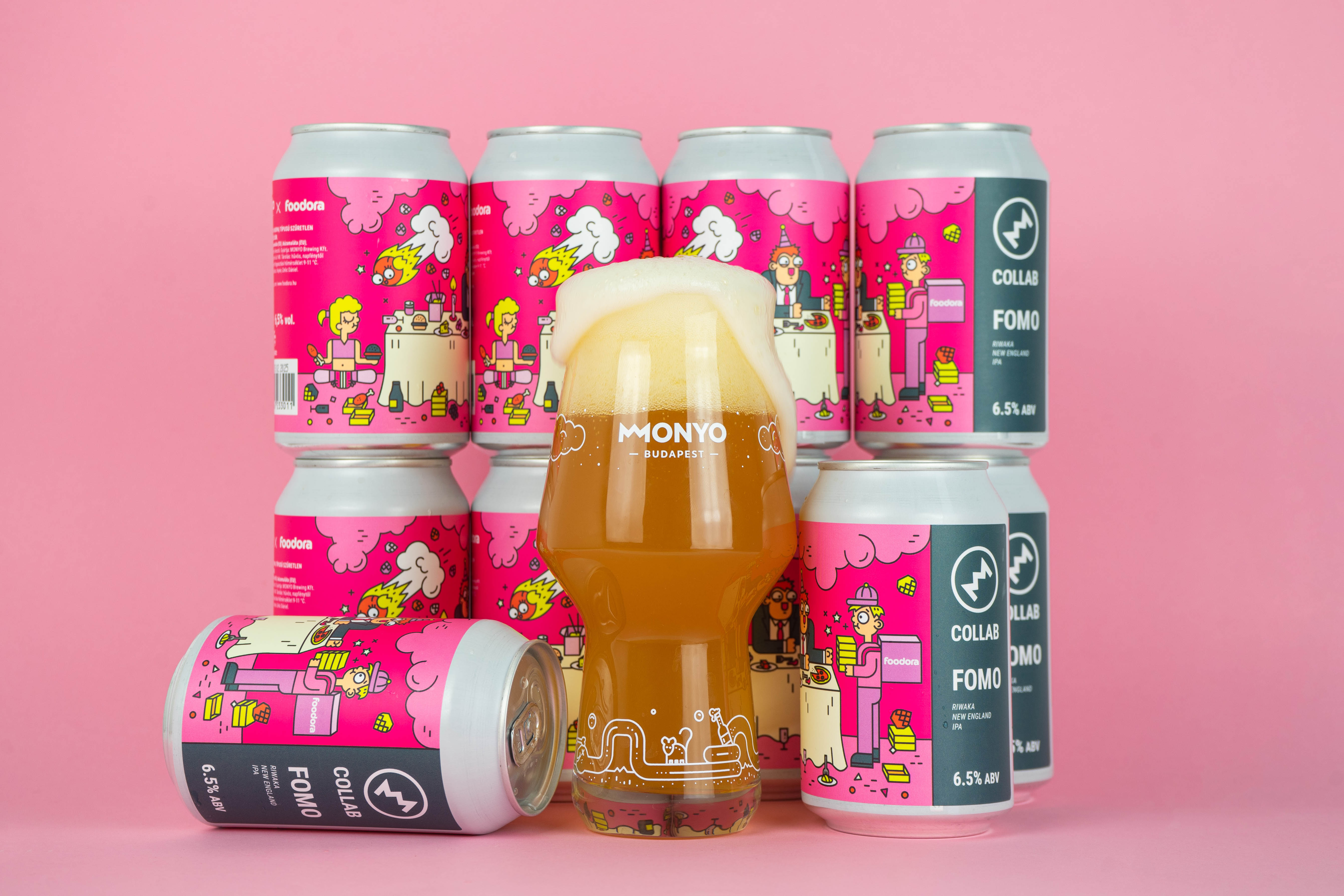 Woman in blue hat and sweater sitting on couch with laptop.