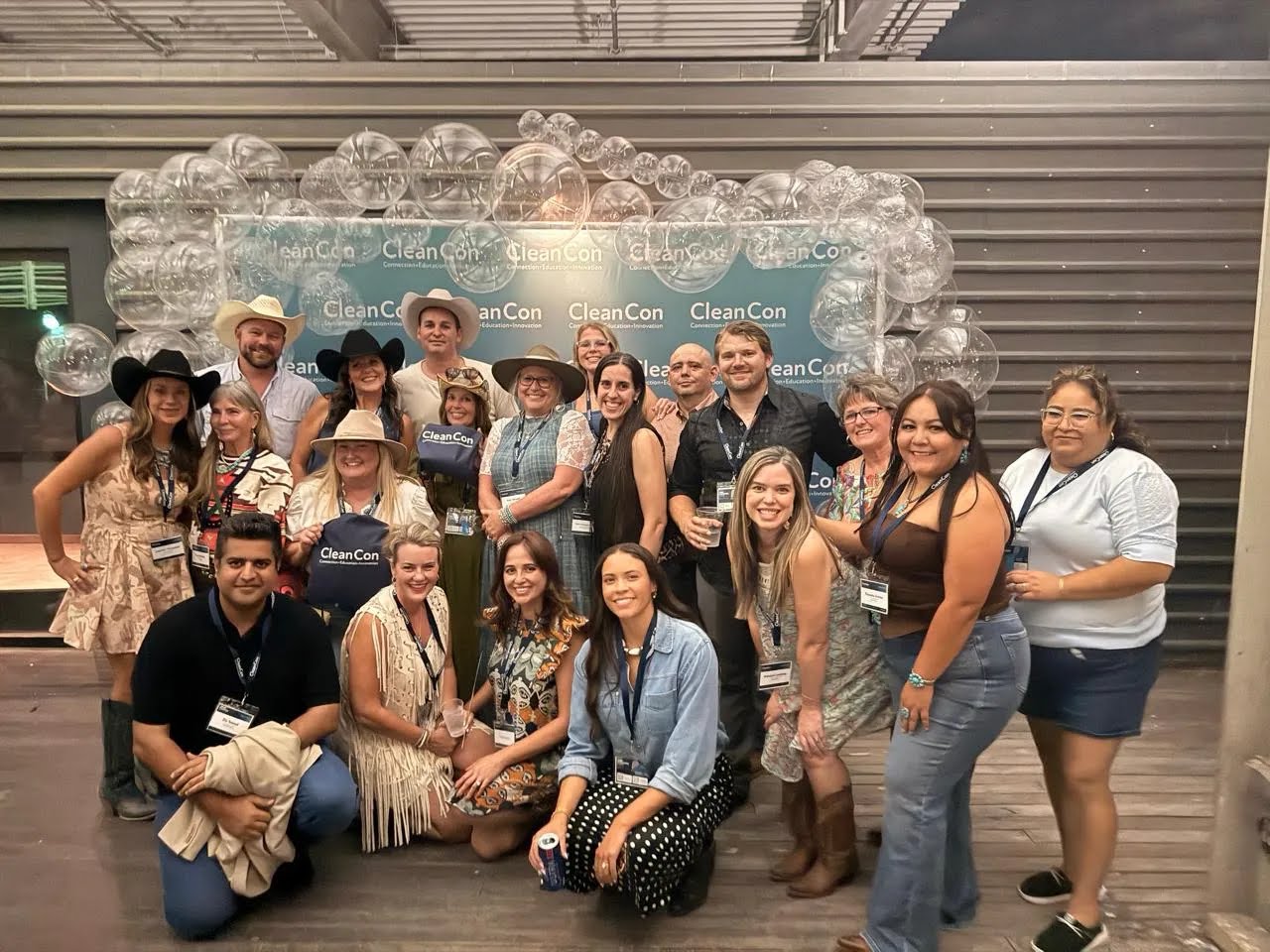 Large group of Fibonacci Agency and cleaning industry founders at the CleanCon Austin 2026 photo backdrop