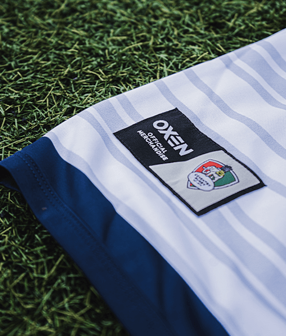 a man in a red and black striped shirt