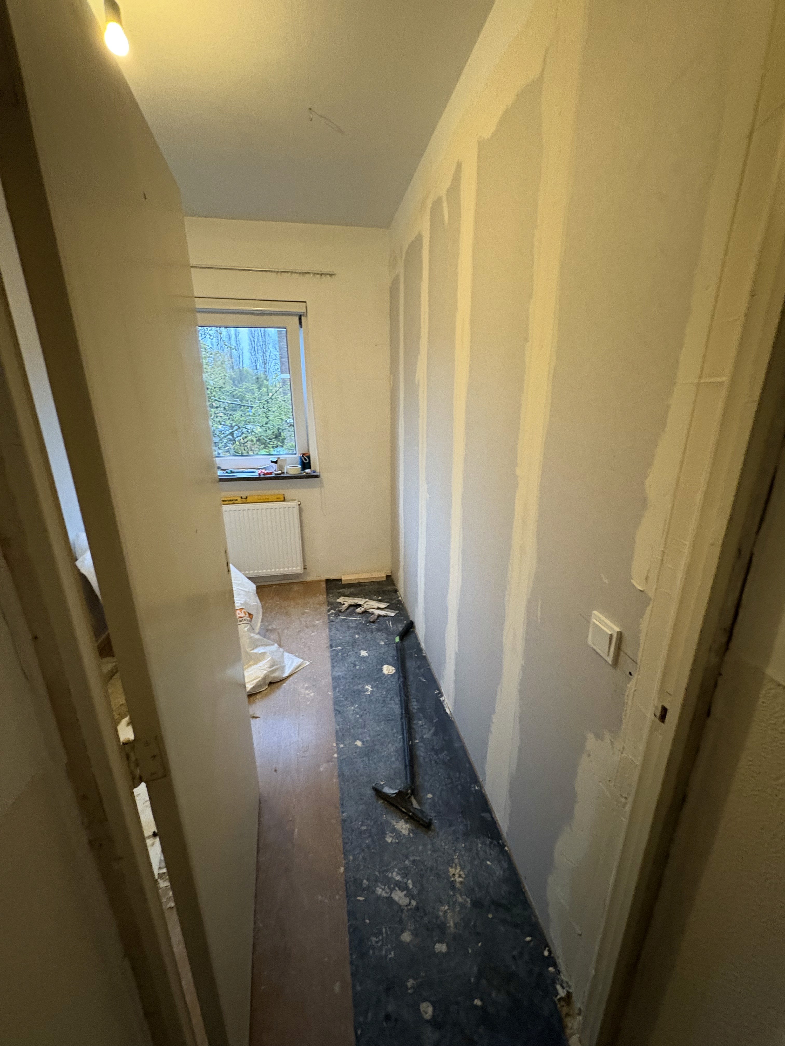 husband and wife working happily on a laptop