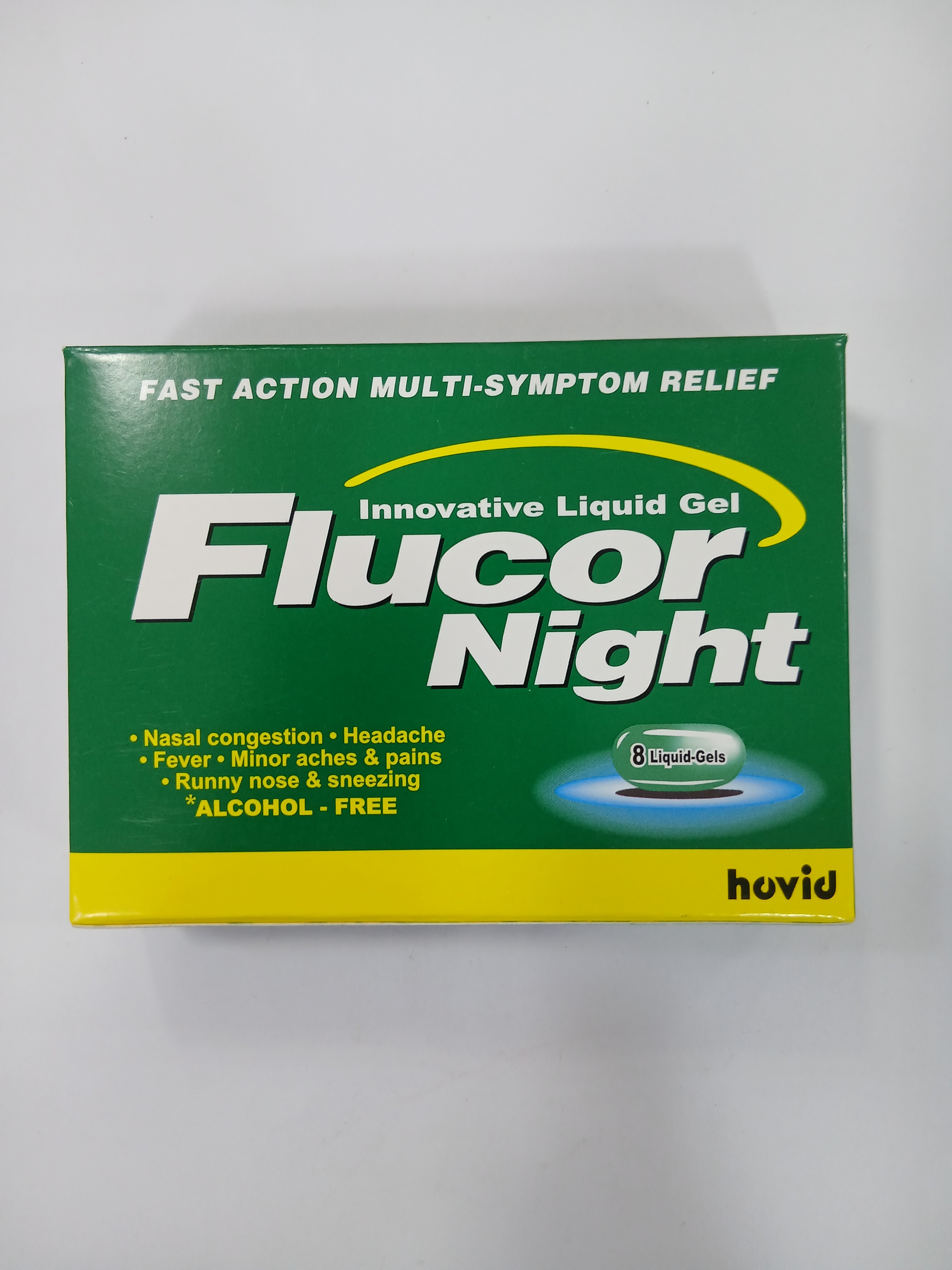 Green and white cardboard box packaging displays text advertising fast-action multi-symptom relief liquid gel with a small circular container illustration.