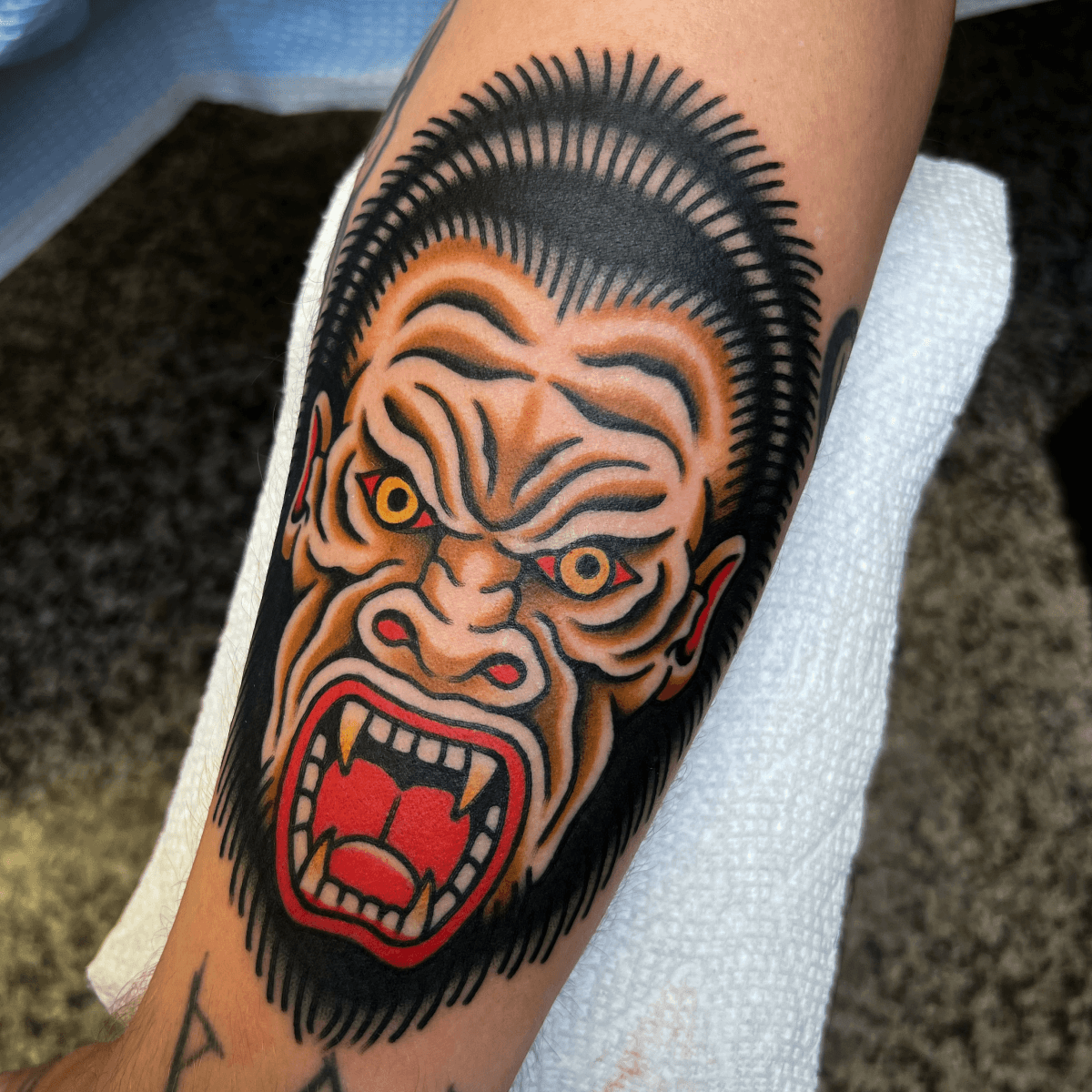 color tattoo of a gorilla head