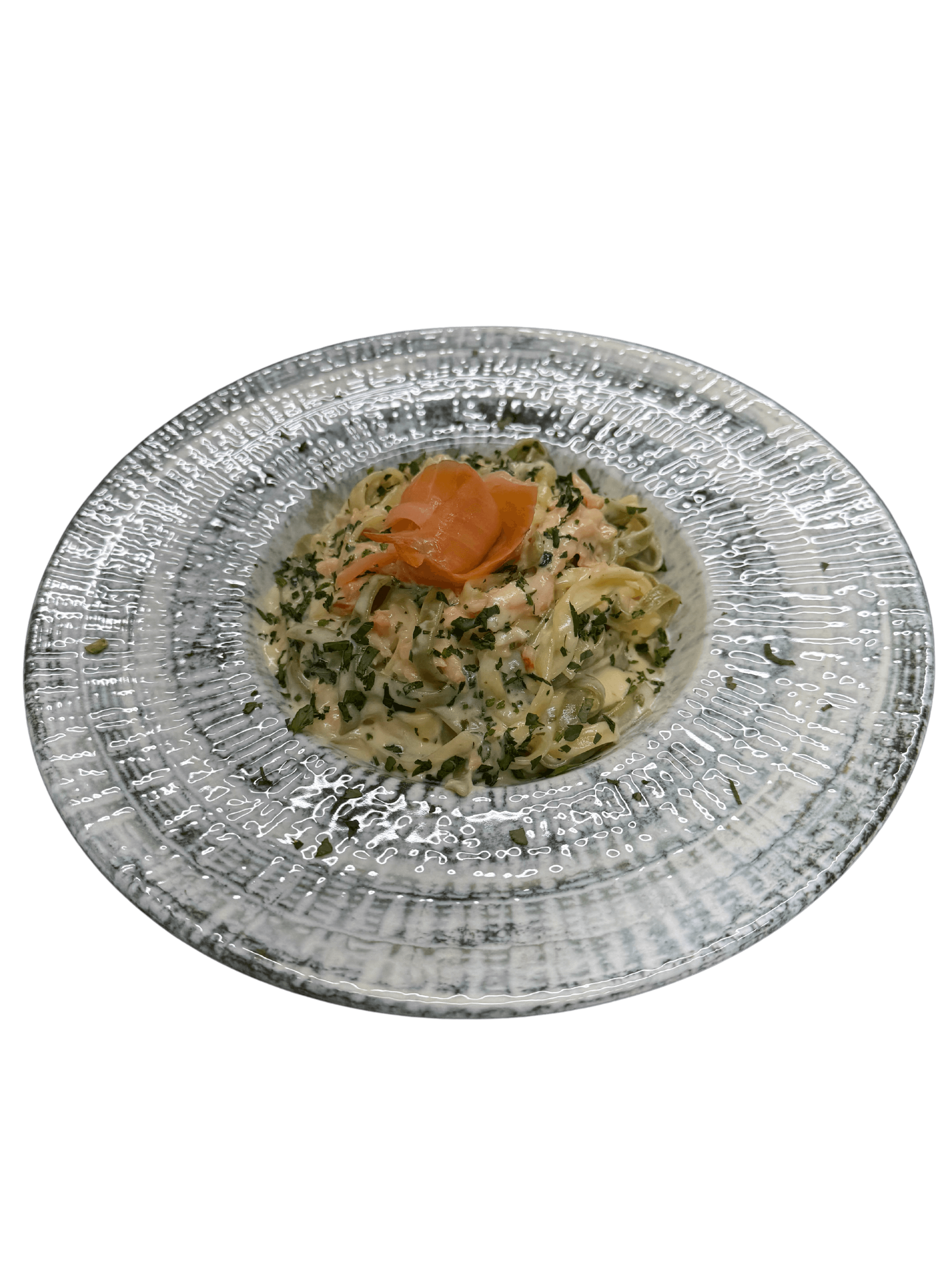 a glass of cocktail with a slime orange fruit