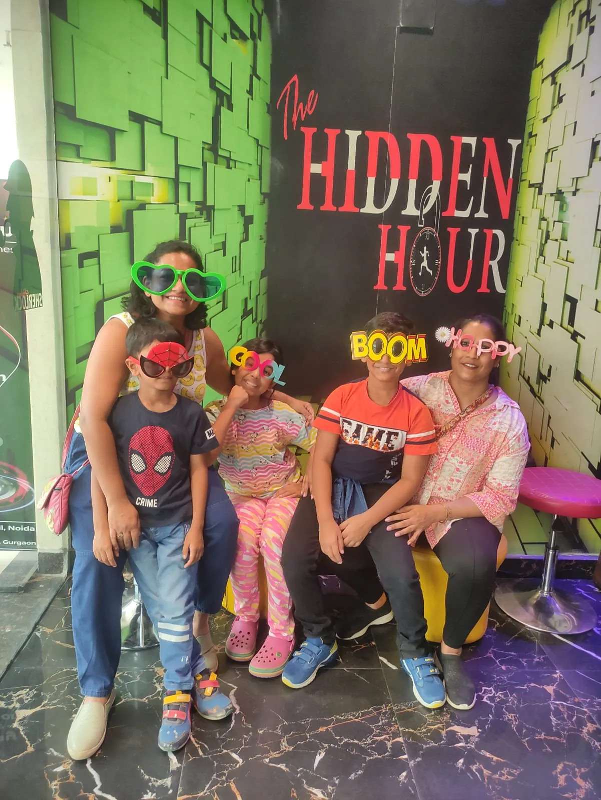 Friends and coworkers celebrating together after completing an escape room challenge