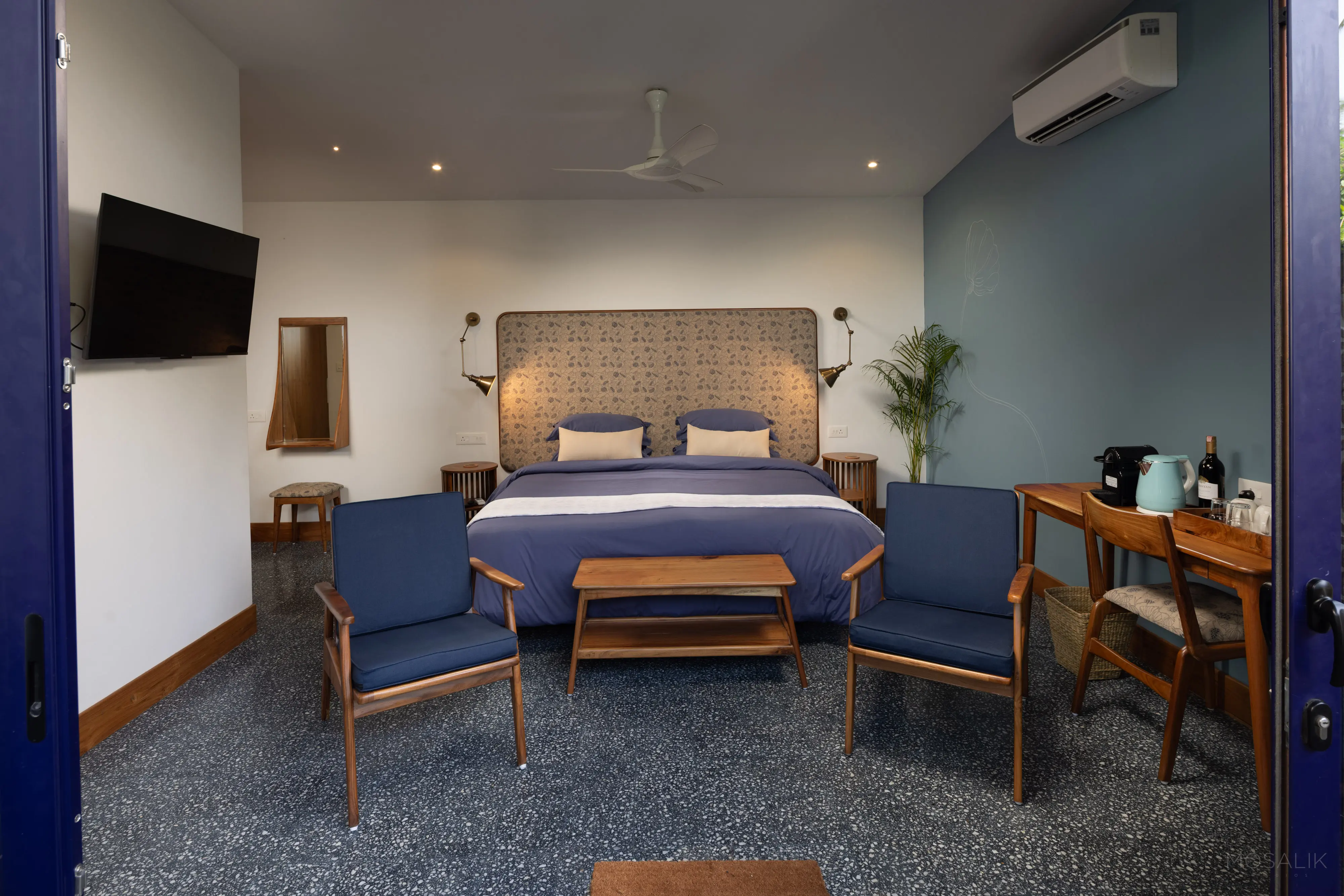 Room Two at Jaali Blue — king bed with jaali-print headboard