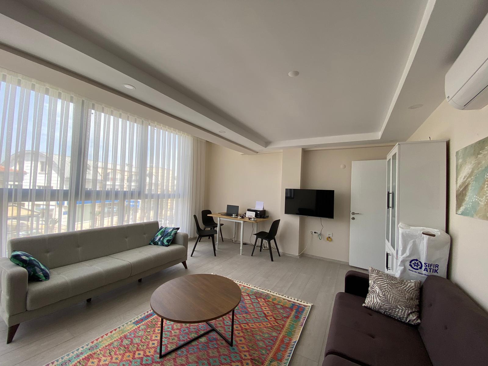 1 bedroom apartment living room interior at Zen Garden Suites Side Antalya