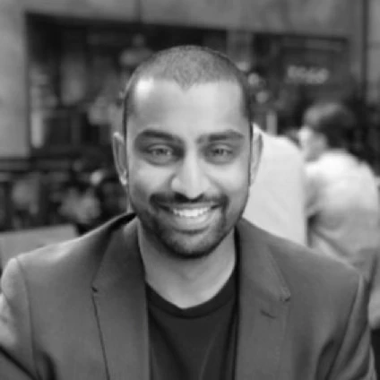 Black-and-white portrait of Trustethica strategic advisor Arvind Shanmuga Nathan.