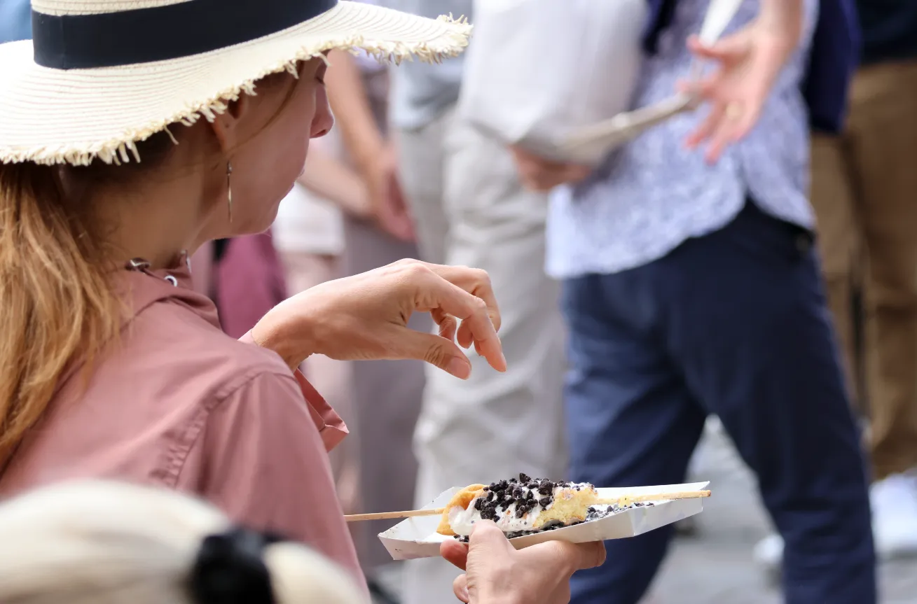 woman eating a wafflestick