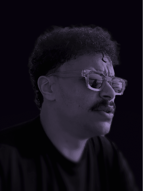 Professional portrait of person on a modern purple gradient background, business headshot for digital branding and team profile.