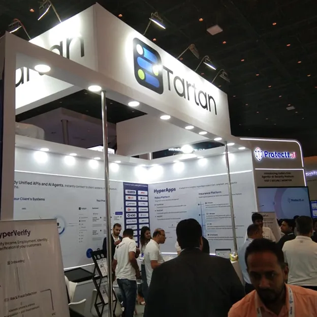 Tartan fintech solutions exhibition booth at a professional software and technology conference.