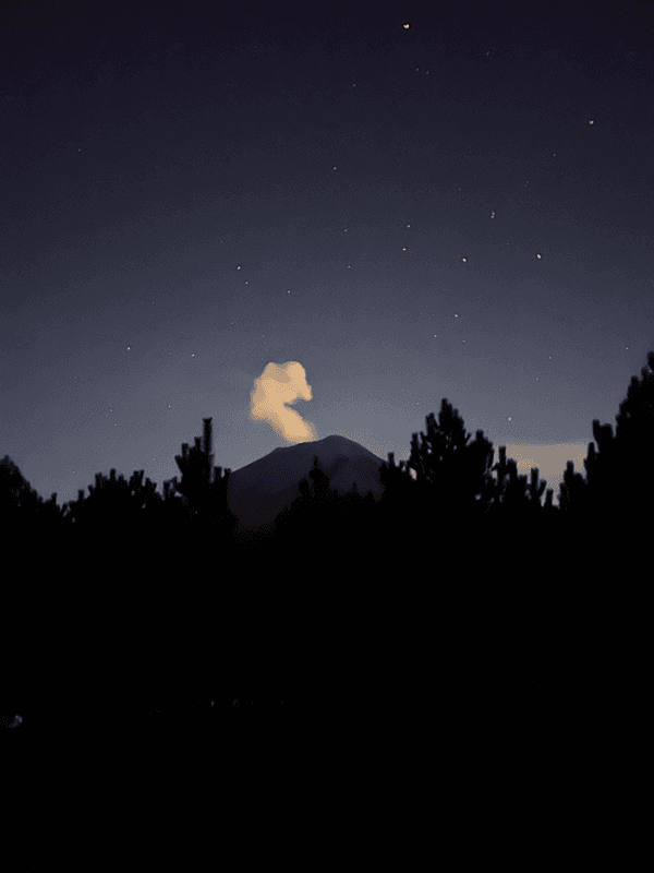 Photo of Popocatépetl erupting at night